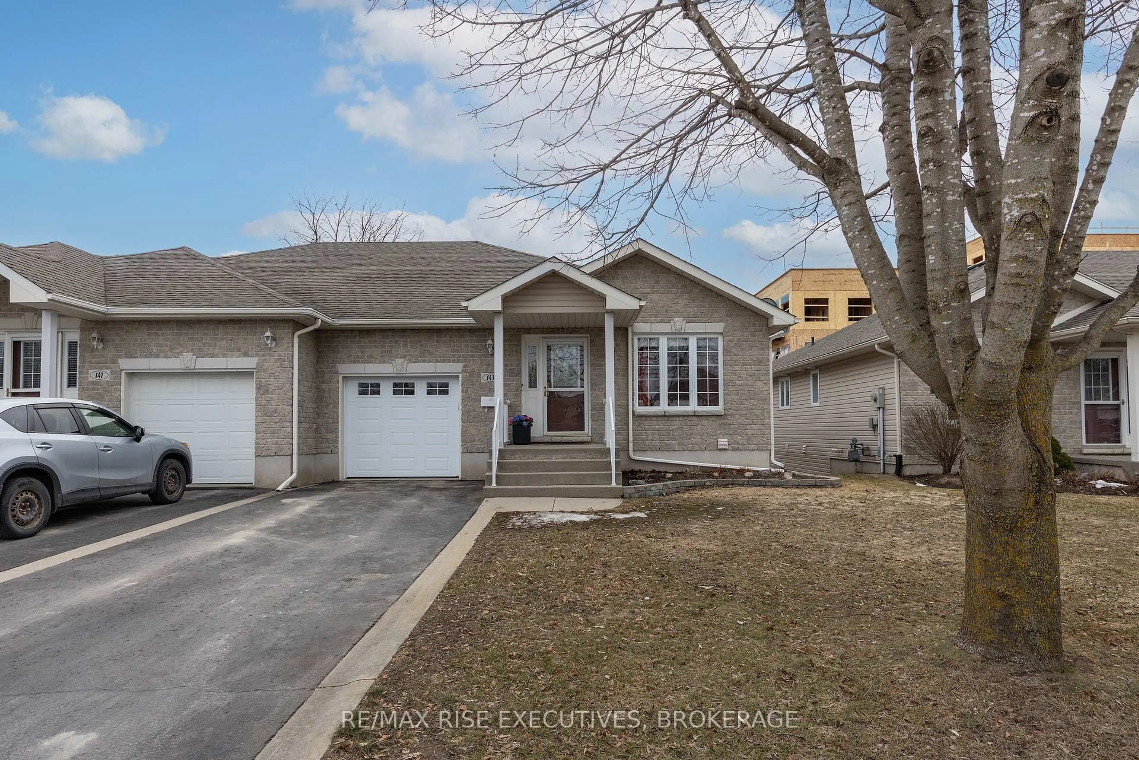 Home with vinyl exterior material, street for 143 Ellesmeer Ave, Kingston Ontario K7P 3H7