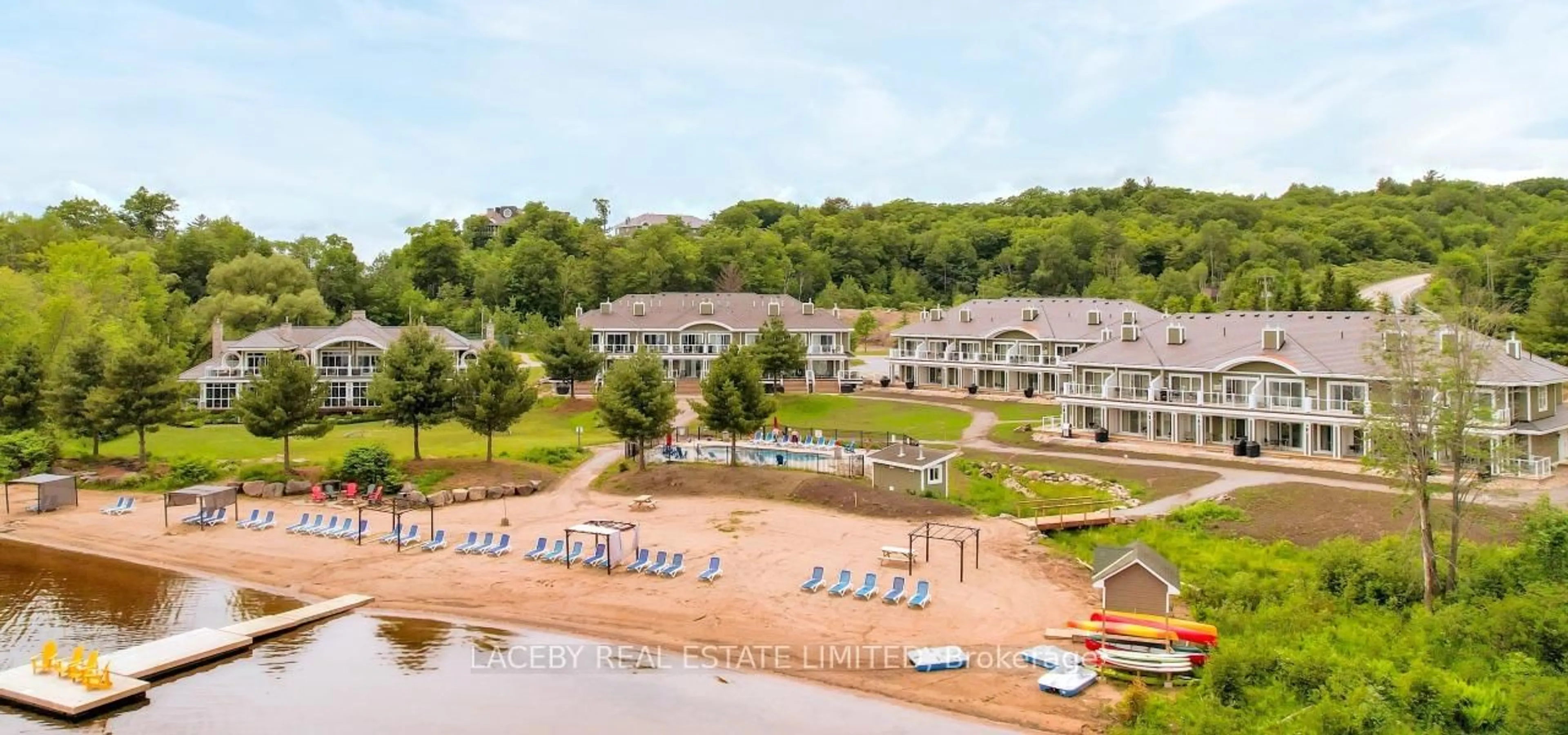 A pic from outside/outdoor area/front of a property/back of a property/a pic from drone, water/lake/river/ocean view for 1869 Muskoka District Rd 118 W, Muskoka Lakes Ontario P1L 1W8