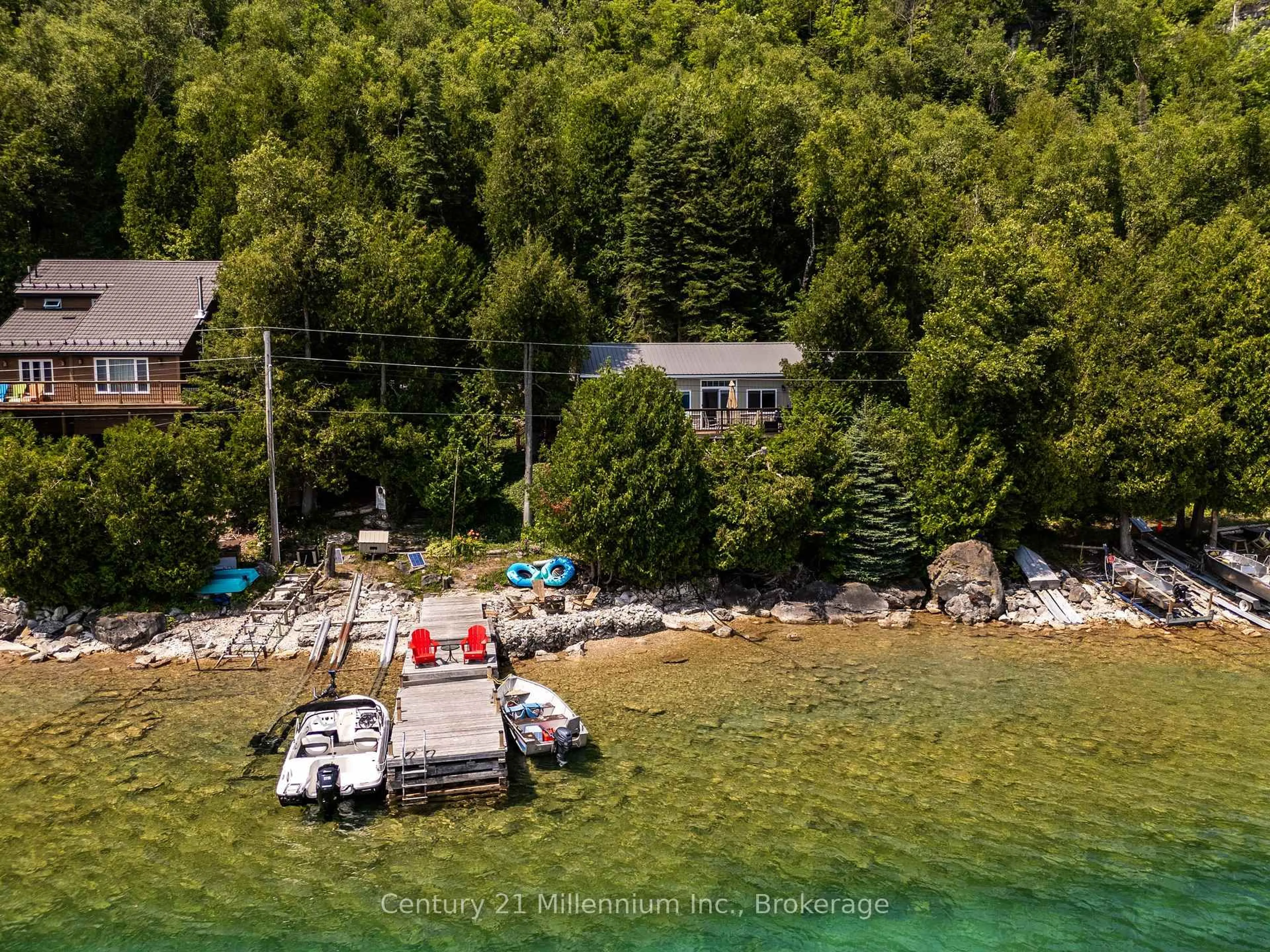 A pic from outside/outdoor area/front of a property/back of a property/a pic from drone, water/lake/river/ocean view for 113 Water St, Northern Bruce Peninsula Ontario N0H 1W0