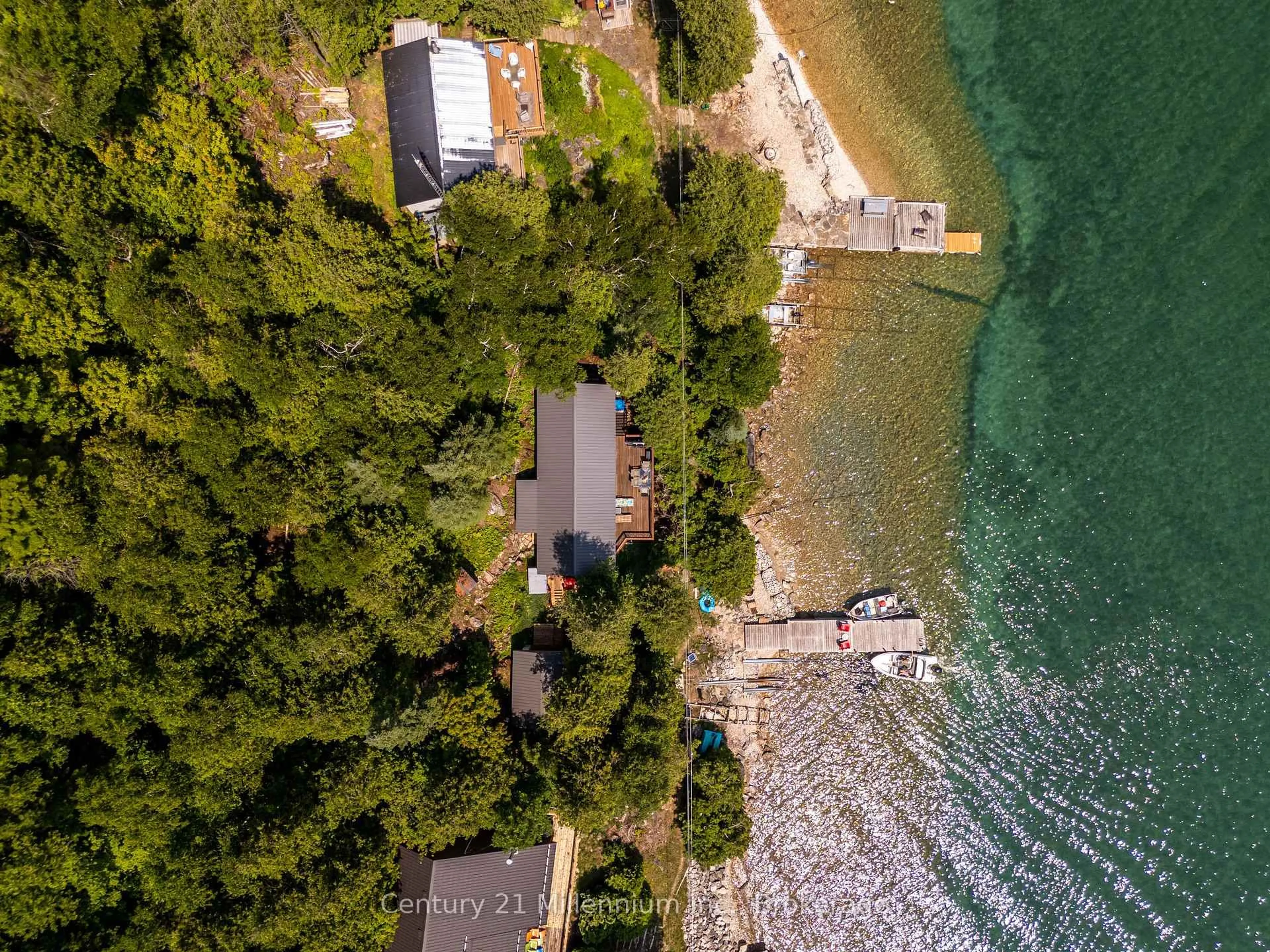 A pic from outside/outdoor area/front of a property/back of a property/a pic from drone, water/lake/river/ocean view for 113 Water St, Northern Bruce Peninsula Ontario N0H 1W0