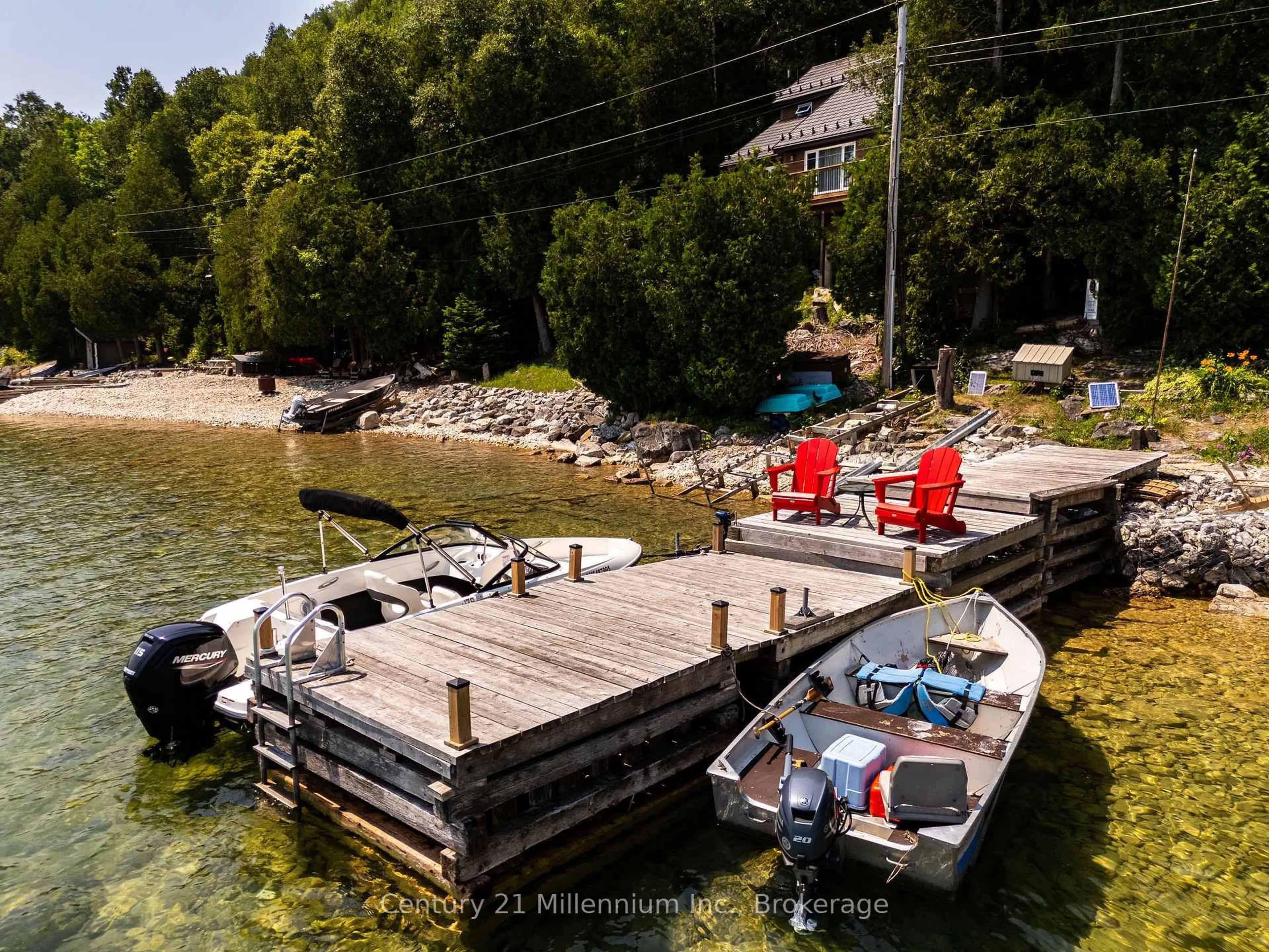 A pic from outside/outdoor area/front of a property/back of a property/a pic from drone, water/lake/river/ocean view for 113 Water St, Northern Bruce Peninsula Ontario N0H 1W0