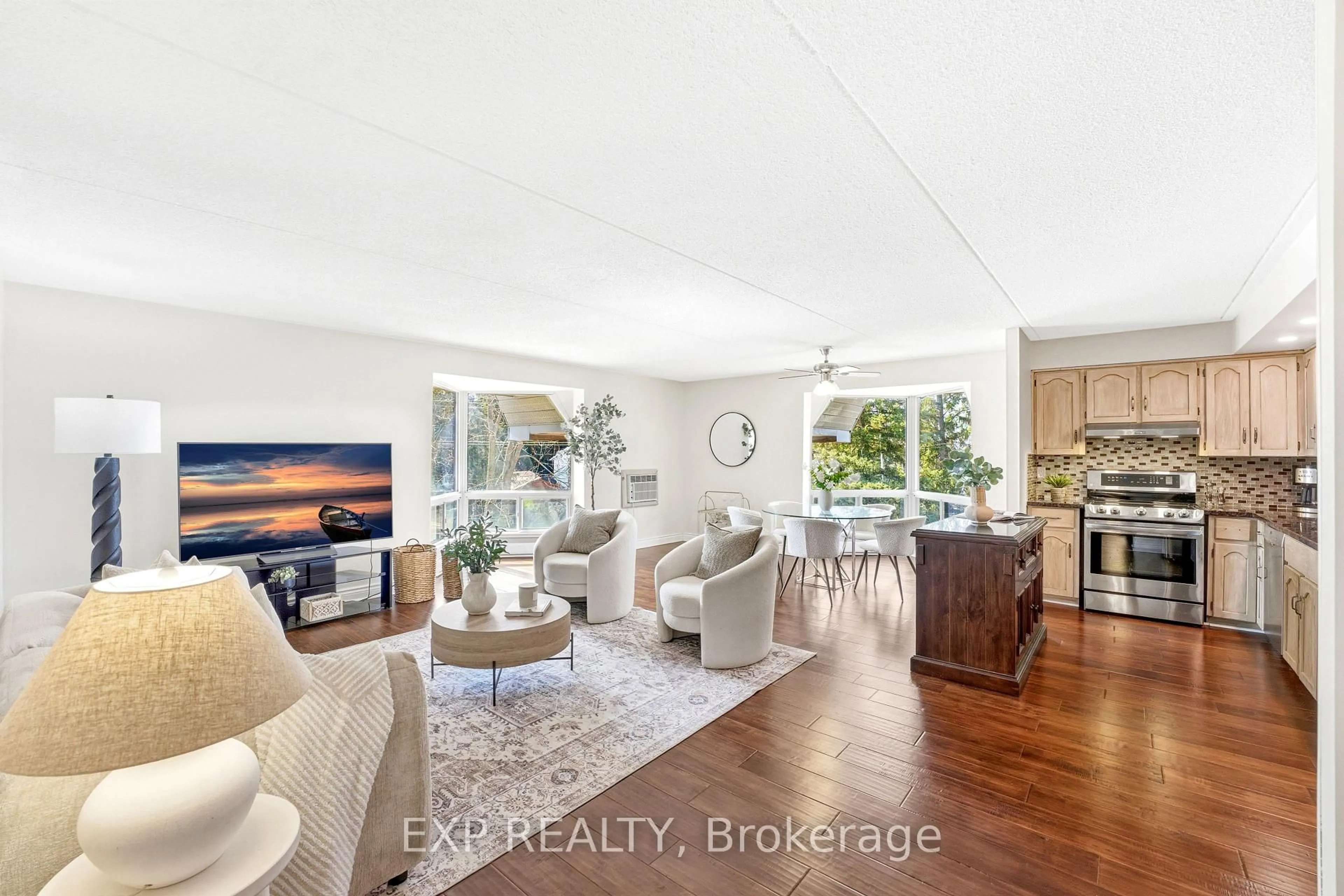 Living room with furniture, unknown for 384 Erb St #404, Waterloo Ontario N2L 1W6