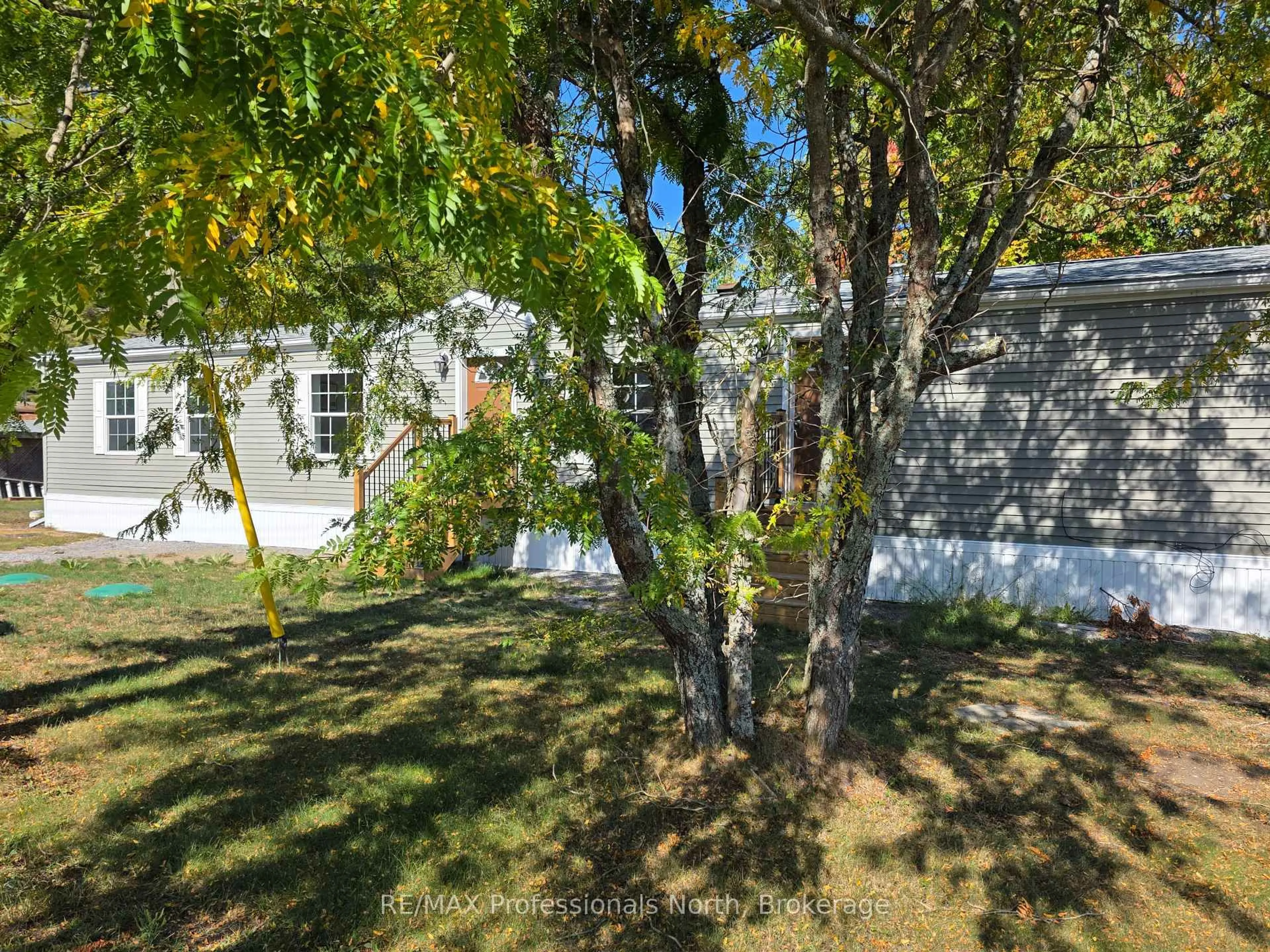 A pic from outside/outdoor area/front of a property/back of a property/a pic from drone, unknown for 1013 Seventh Lane, Minden Hills Ontario K0M 2K0