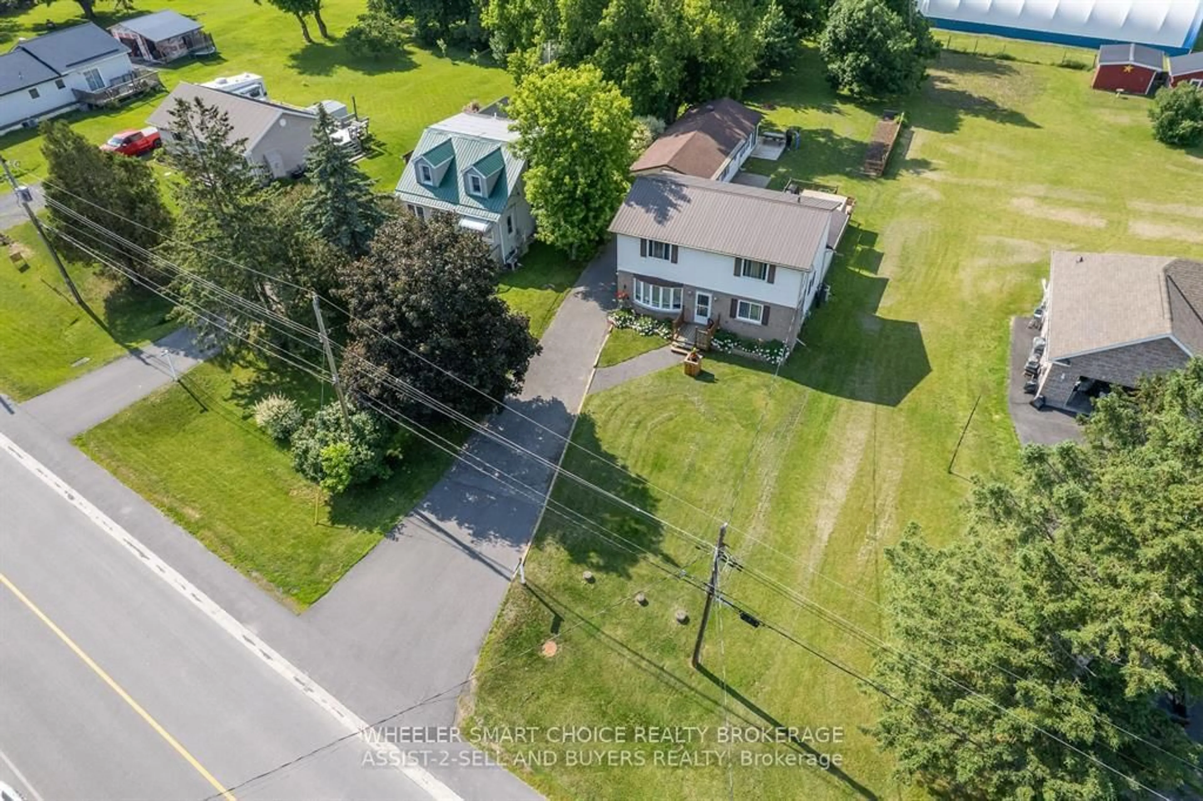 A pic from outside/outdoor area/front of a property/back of a property/a pic from drone, street for 17407 County Rd 18 Rd, South Stormont Ontario K0C 2A0