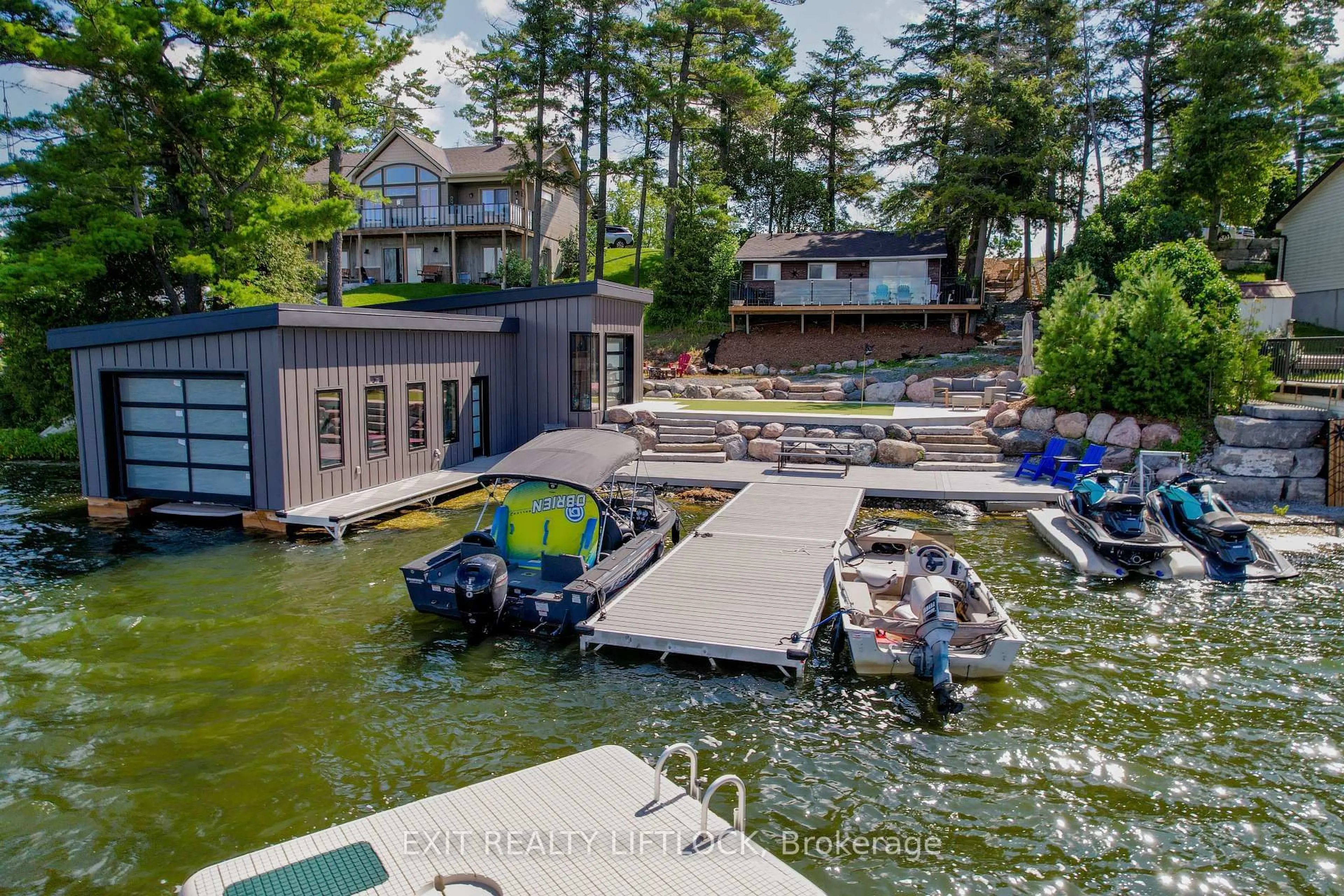 A pic from outside/outdoor area/front of a property/back of a property/a pic from drone, water/lake/river/ocean view for 854 Fife's Bay Marina Lane, Selwyn Ontario K9J 6X3