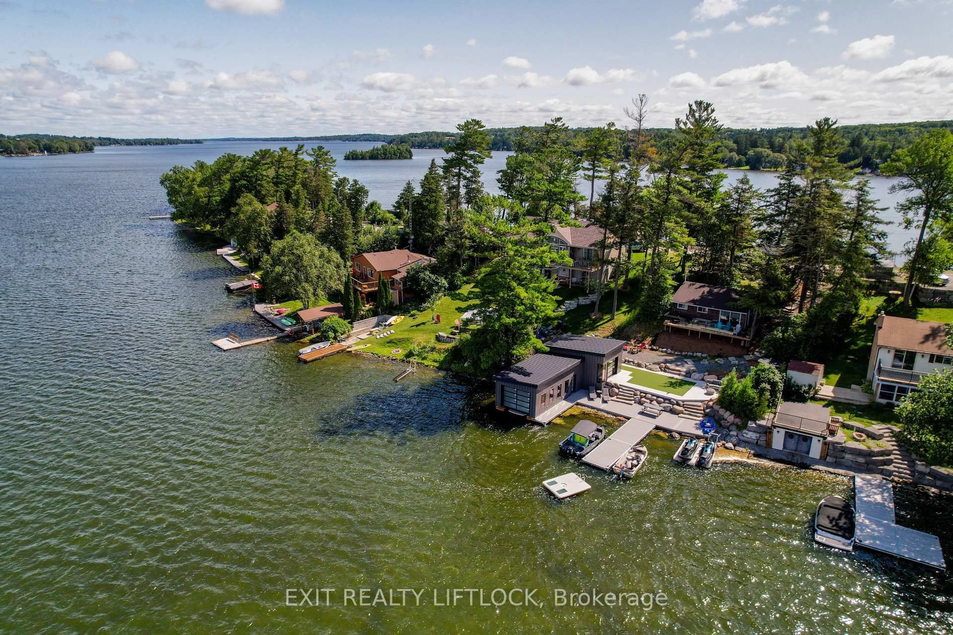 A pic from outside/outdoor area/front of a property/back of a property/a pic from drone, water/lake/river/ocean view for 854 Fife's Bay Marina Lane, Selwyn Ontario K9J 6X3