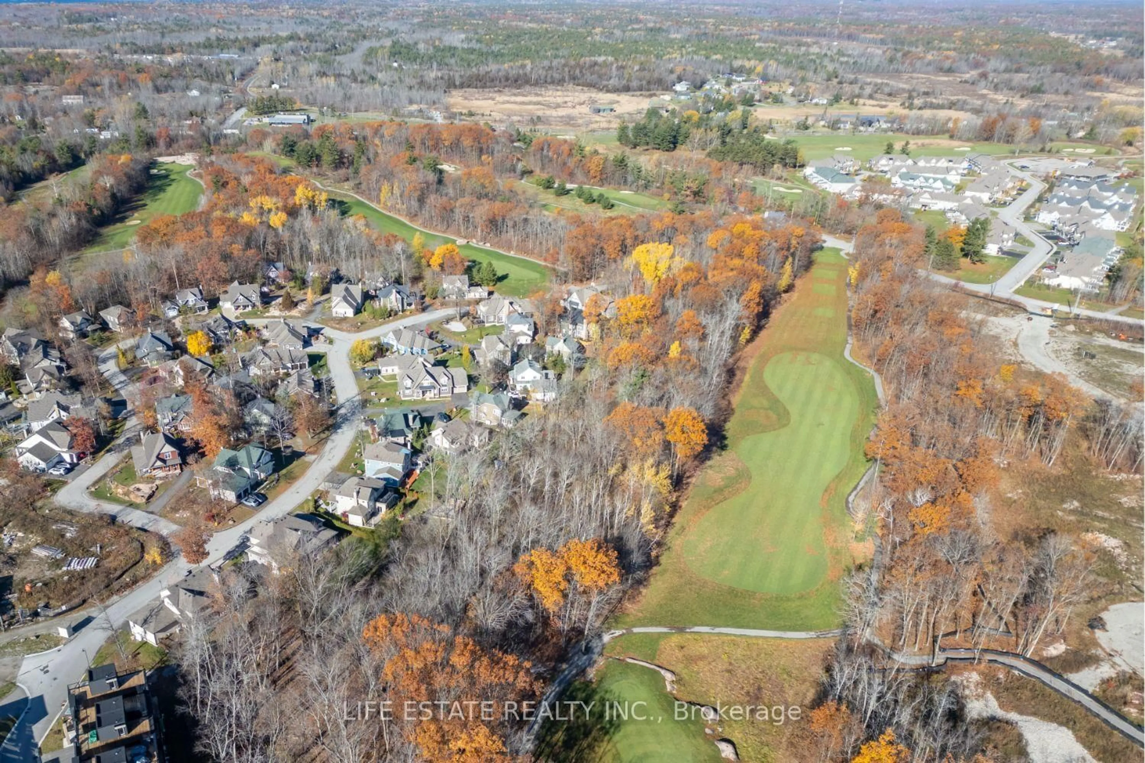 A pic from outside/outdoor area/front of a property/back of a property/a pic from drone, forest/trees view for 39 Country Tr #20, Georgian Bay Ontario L0K 1S0