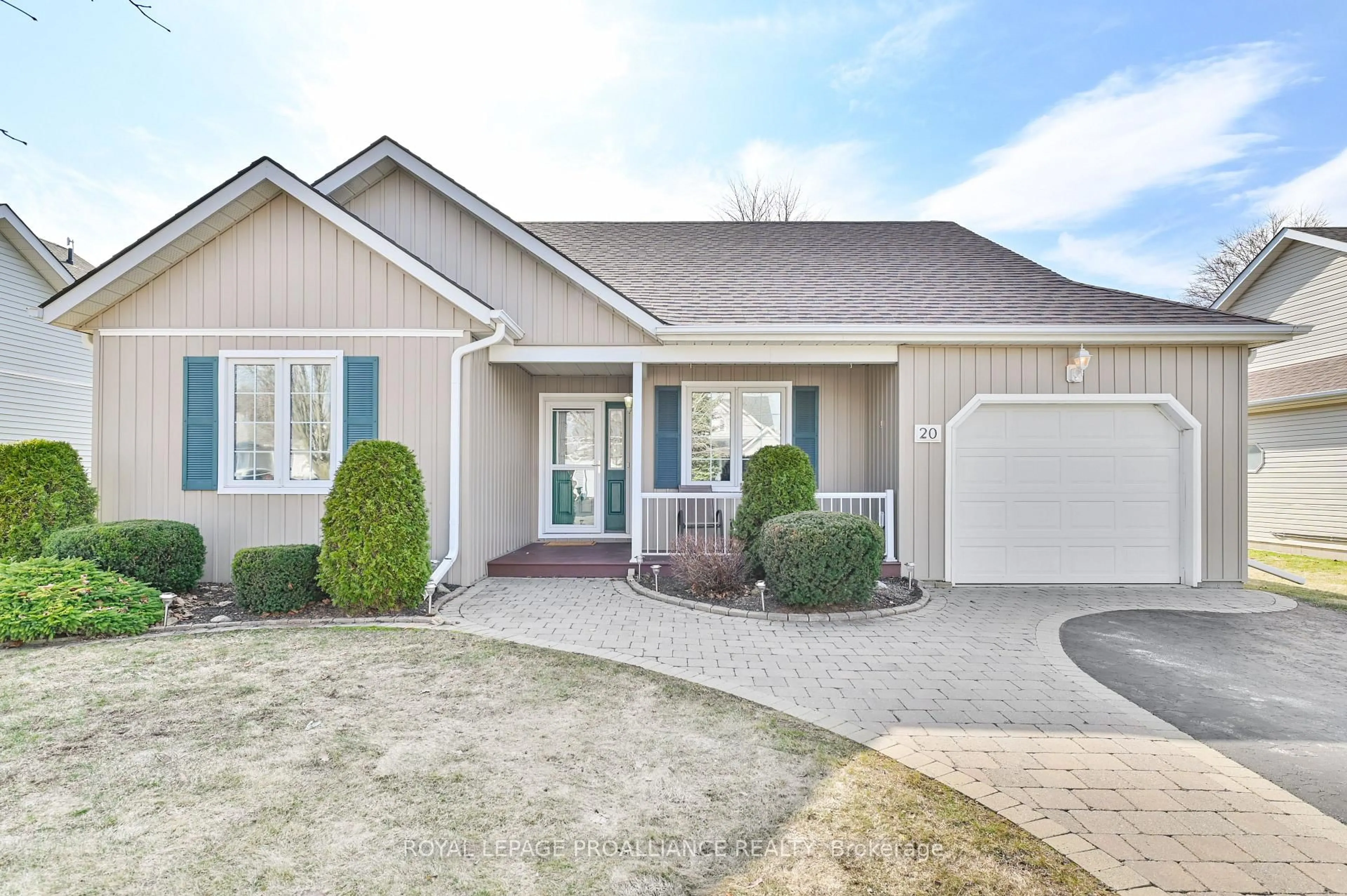 Home with vinyl exterior material, street for 20 Lockwood Dr, Brighton Ontario K0K 1H0