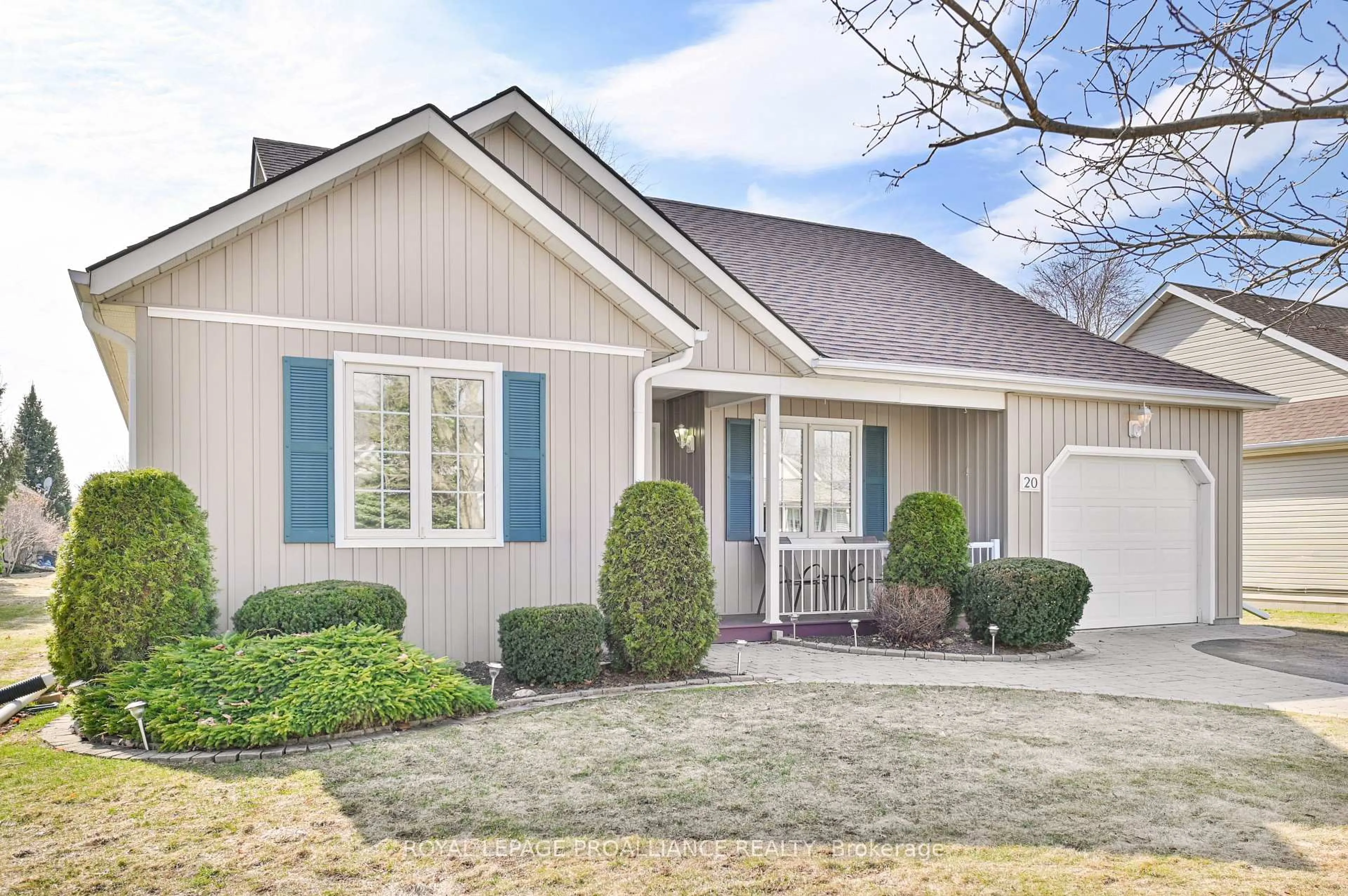 Home with vinyl exterior material, street for 20 Lockwood Dr, Brighton Ontario K0K 1H0