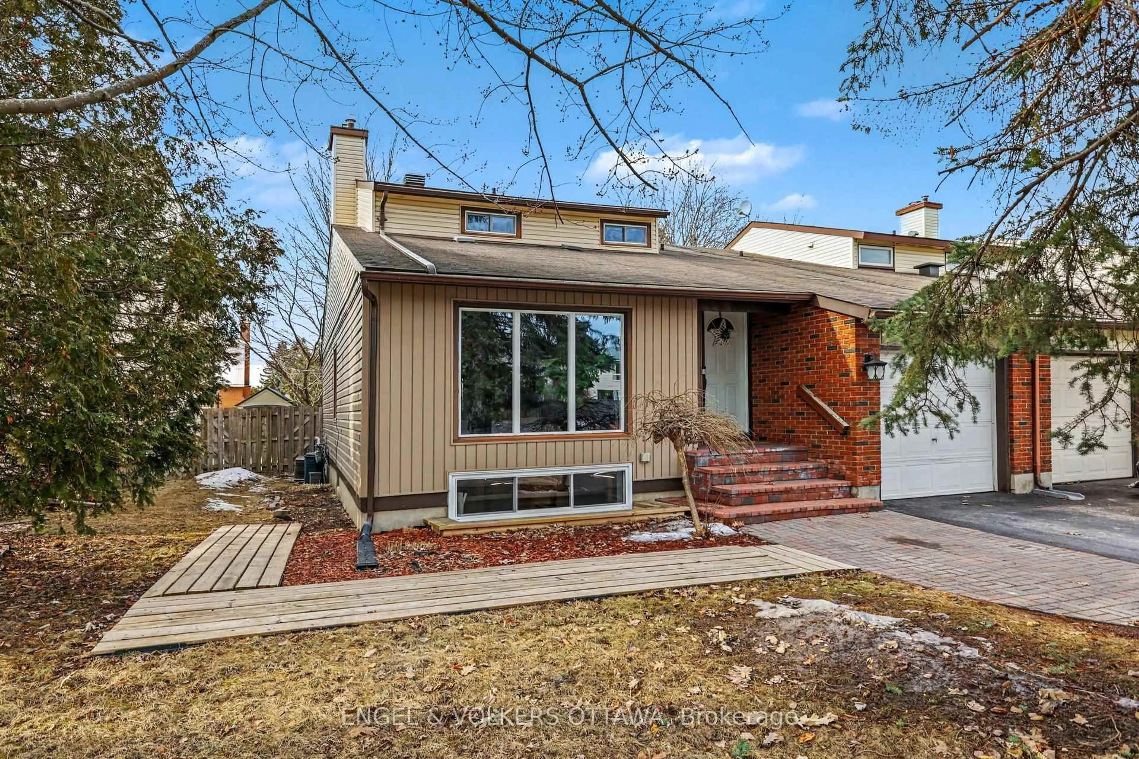 Home with brick exterior material, street for 64 Malvern Dr, Nepean Ontario K2J 1M1