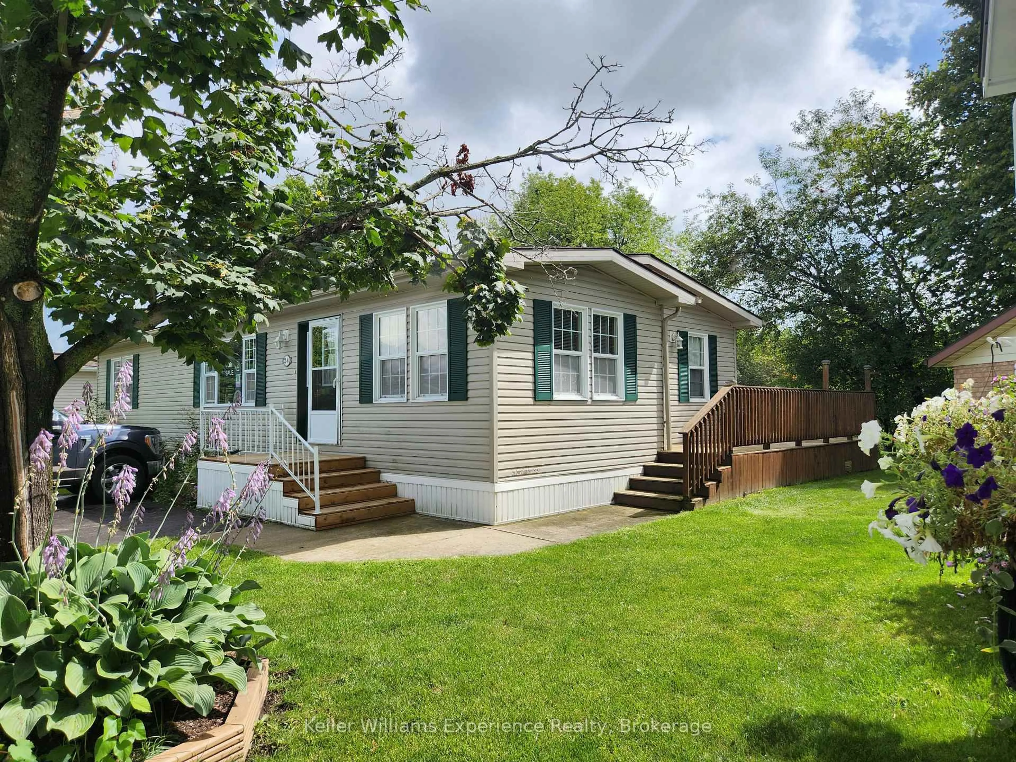 Home with vinyl exterior material, street for 6512 Minto Line 12 #J-24, Minto Ontario N0G 1M0