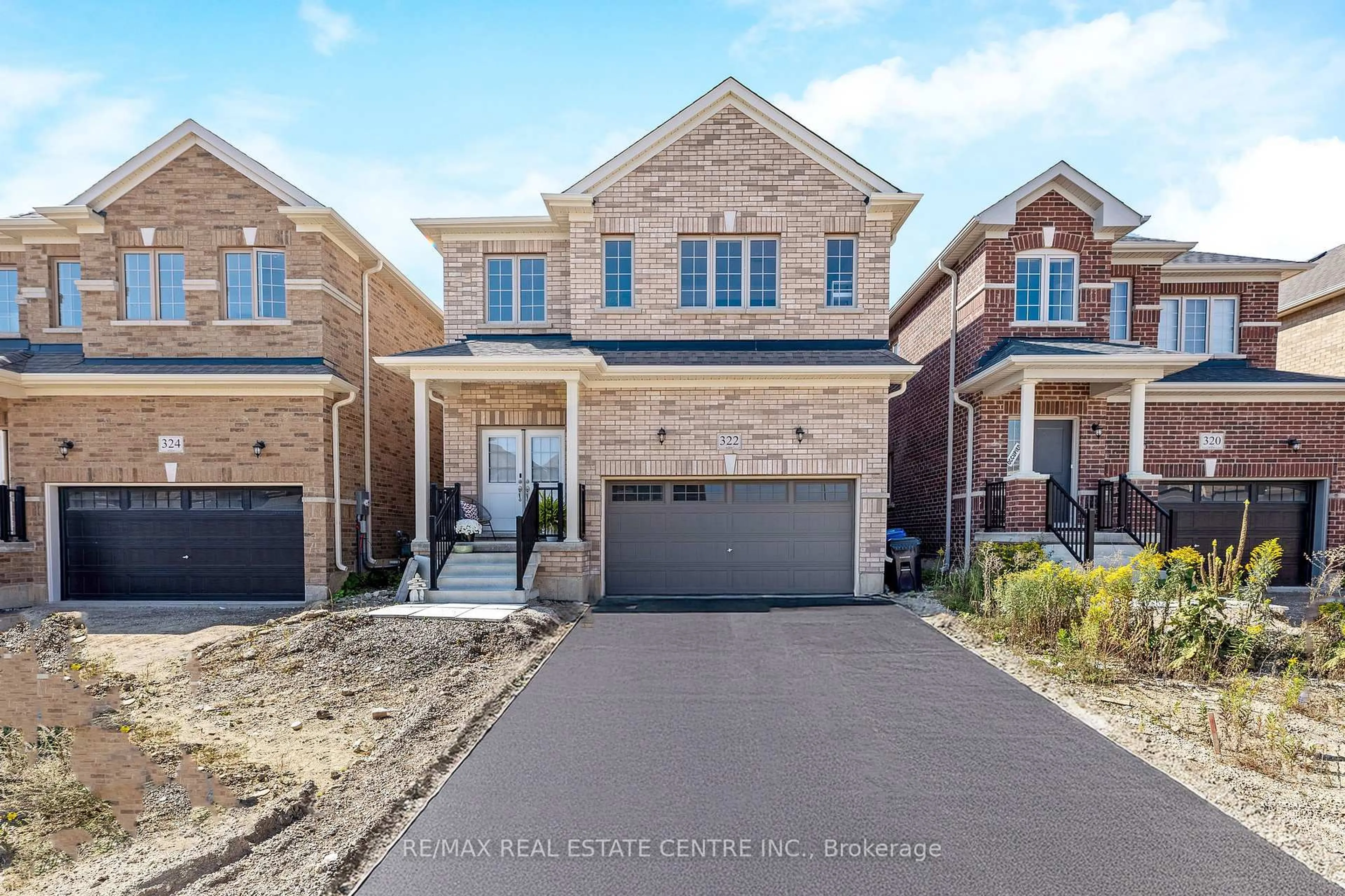 Home with brick exterior material, street for 322 Russell St, Southgate Ontario N0C 1B0