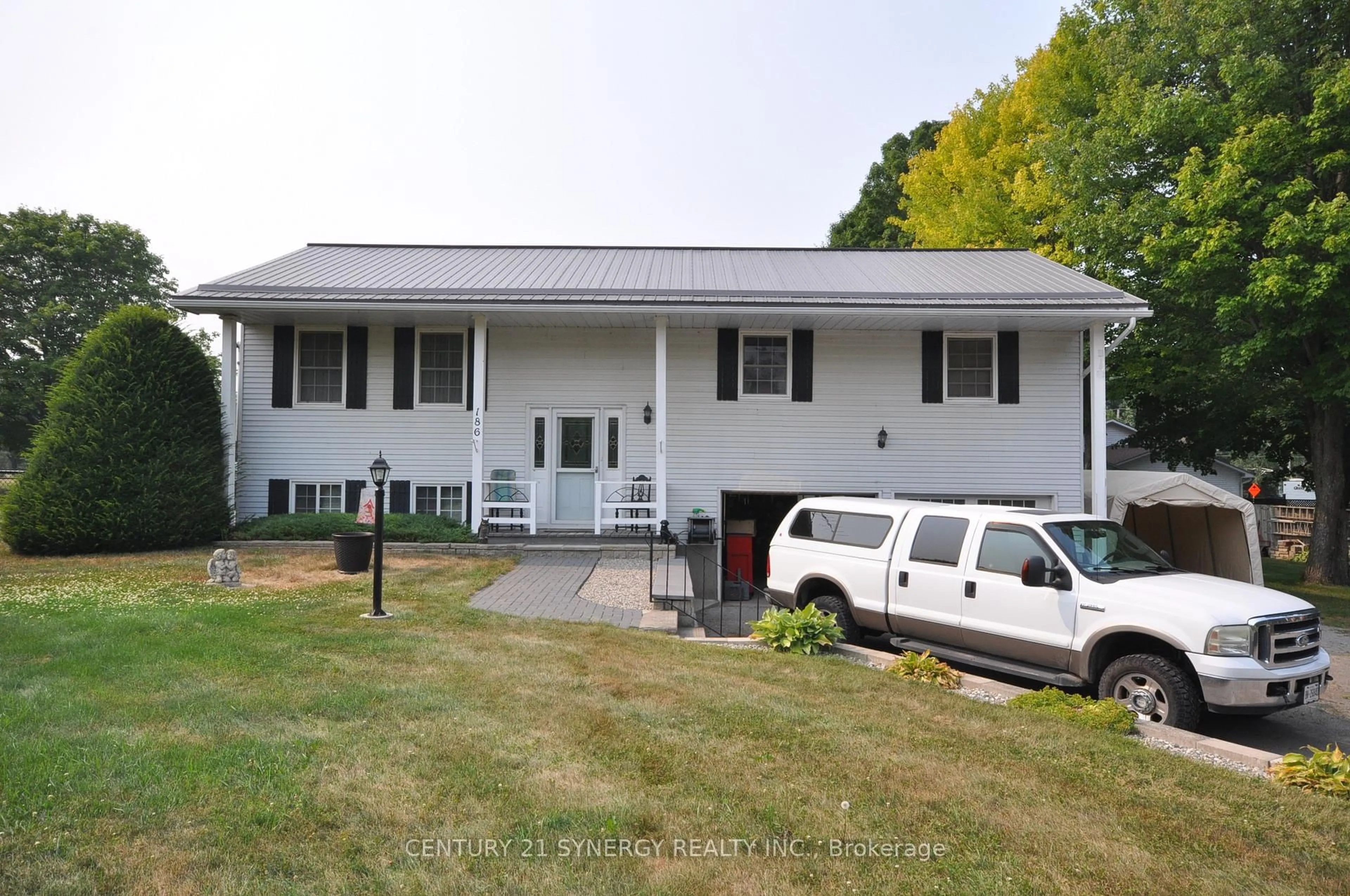 Home with vinyl exterior material, street for 186 Golf Club Rd, Rideau Lakes Ontario K7A 4S5