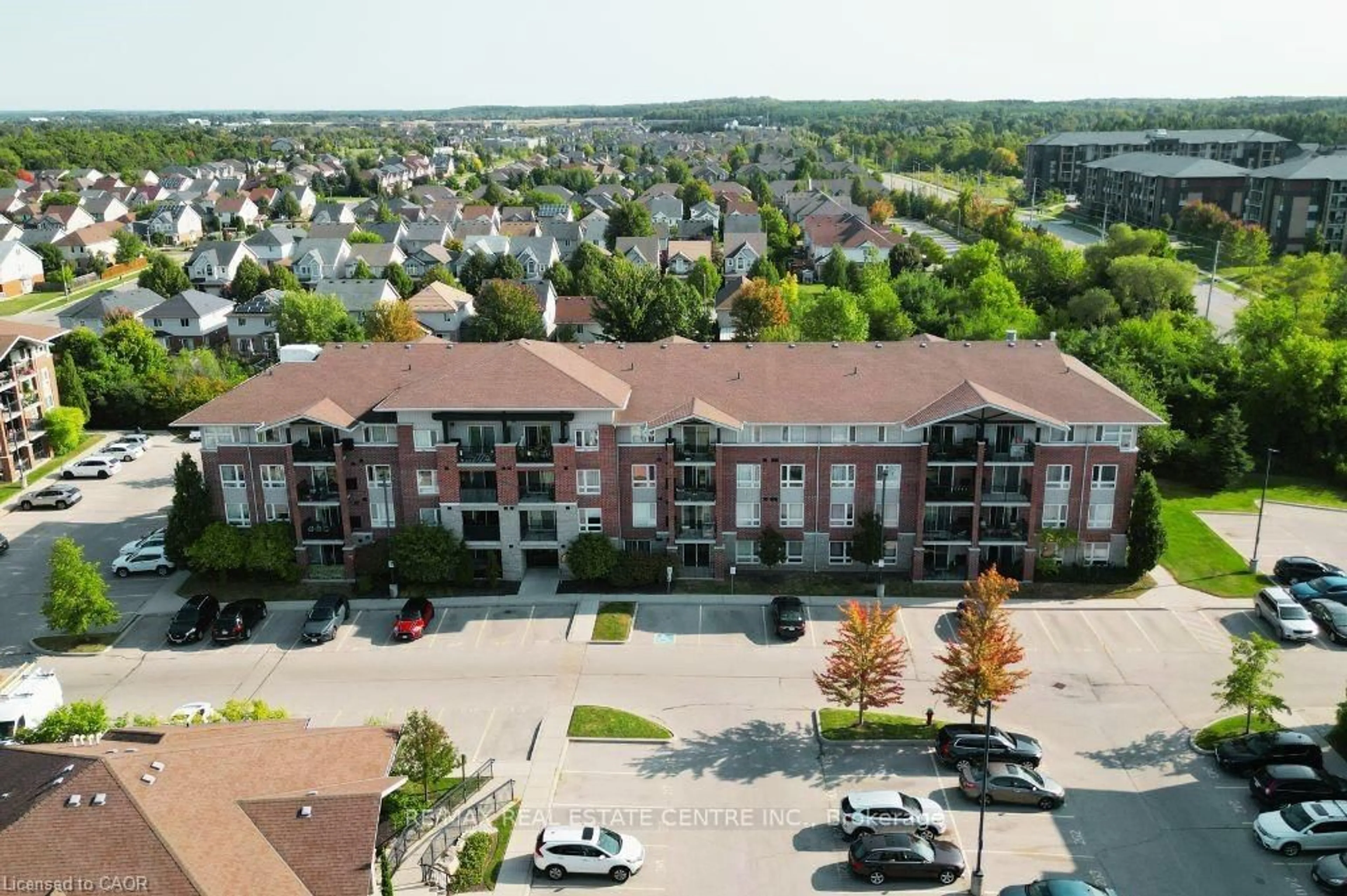 A pic from outside/outdoor area/front of a property/back of a property/a pic from drone, unknown for 41 Goodwin Dr #202, Guelph Ontario N1L 0E7