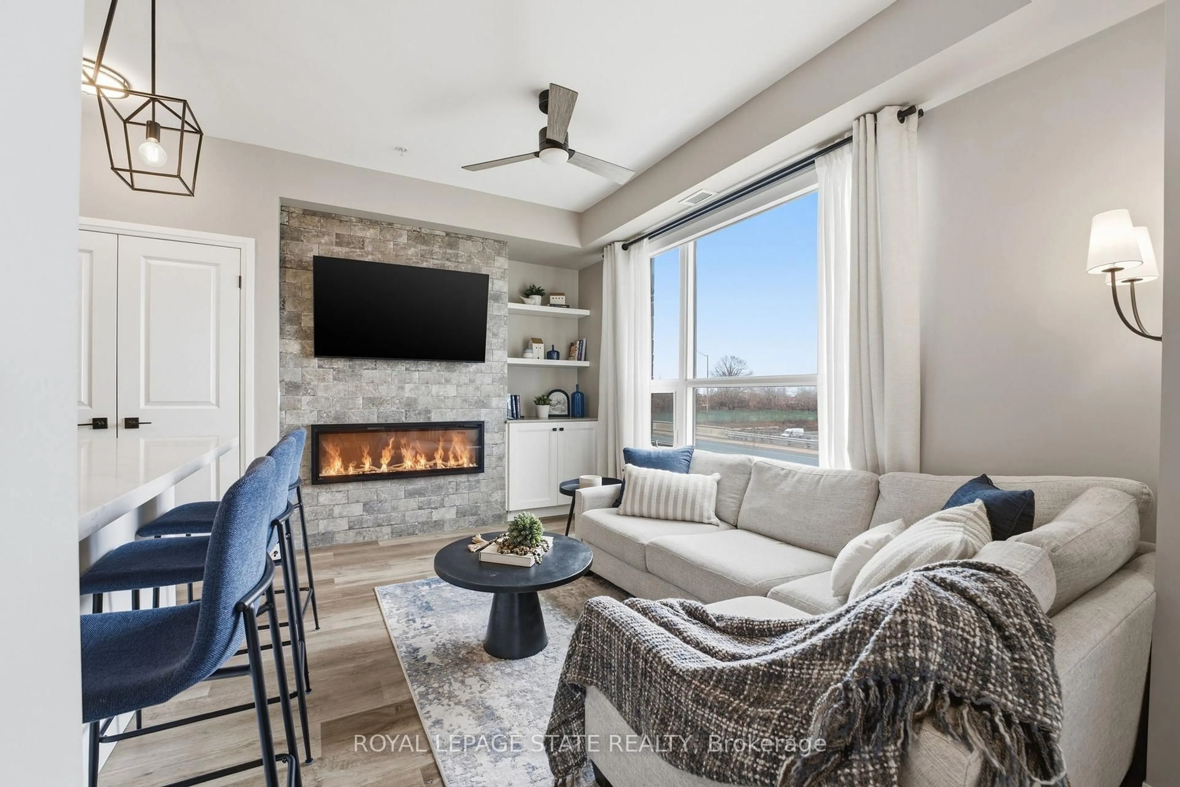 Living room with furniture, unknown for 120 Springvalley Cres #203, Hamilton Ontario L9C 0E4