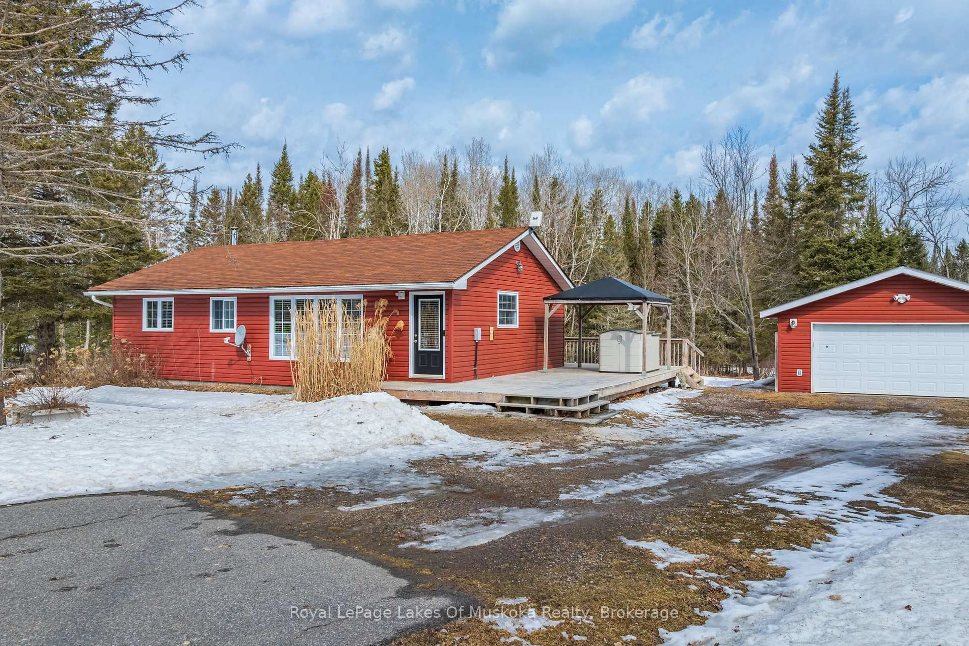 A pic from outside/outdoor area/front of a property/back of a property/a pic from drone, street for 1 Christopher Lane, Armour Ontario P0A 1C0