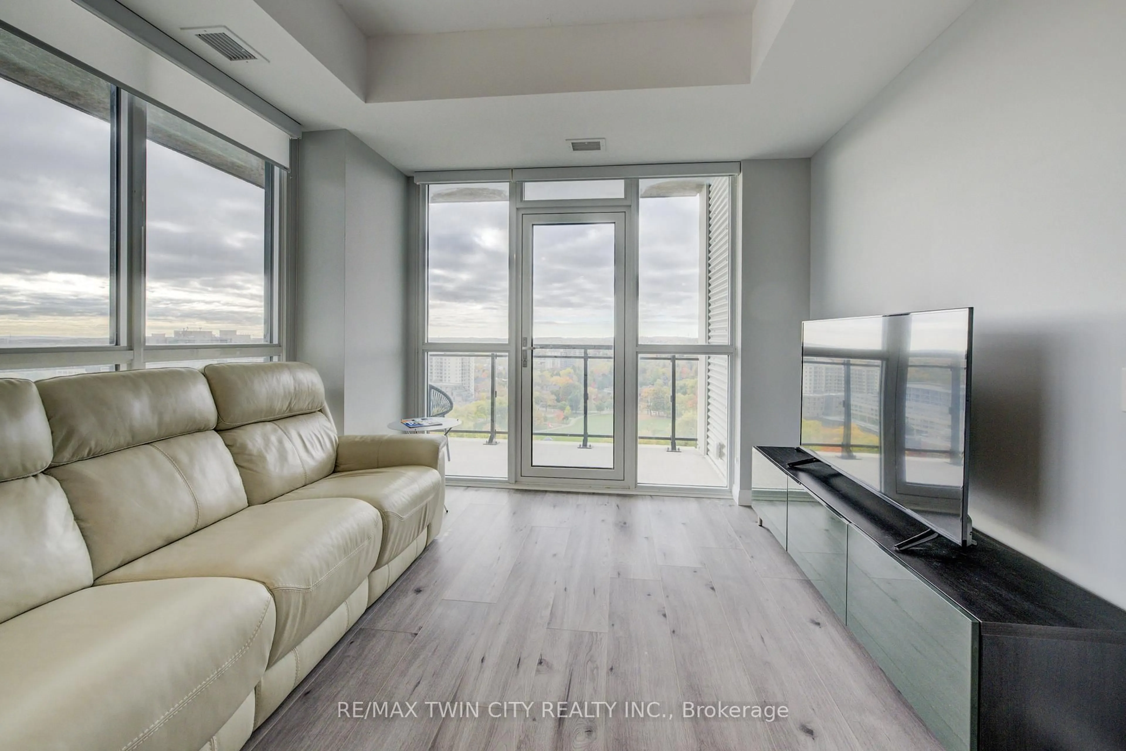 Living room with furniture, unknown for 60 Charles St #1805, Kitchener Ontario N2G 0C9