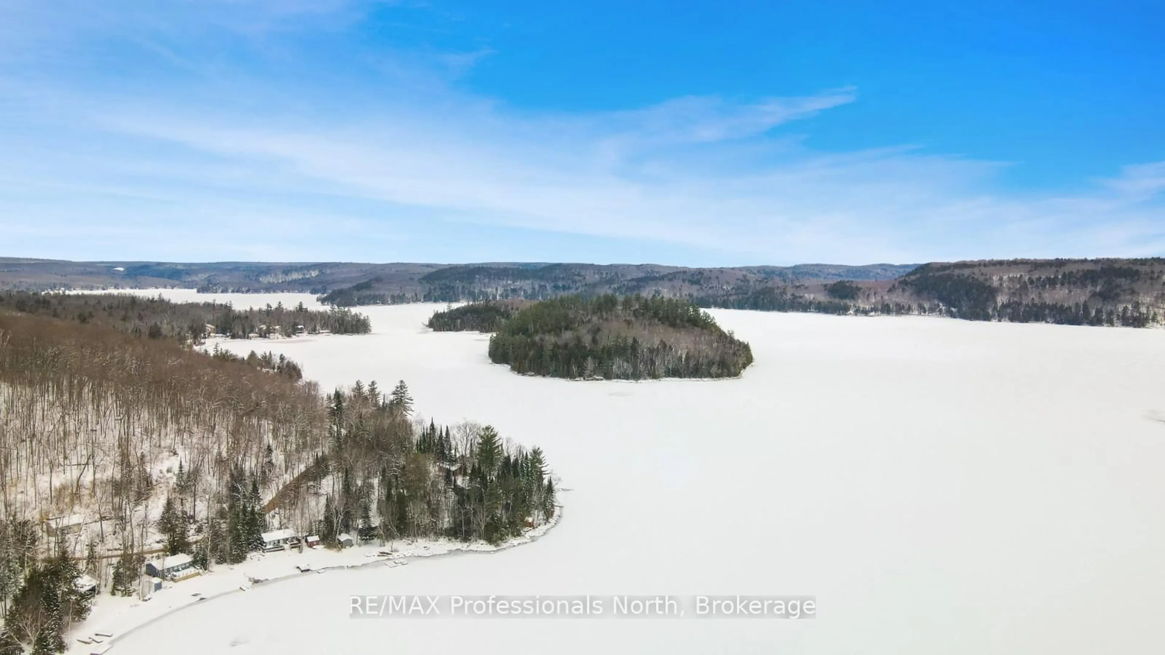 A pic from outside/outdoor area/front of a property/back of a property/a pic from drone, water/lake/river/ocean view for 1027 Dow Tr, Dysart et al Ontario K0M 1S0
