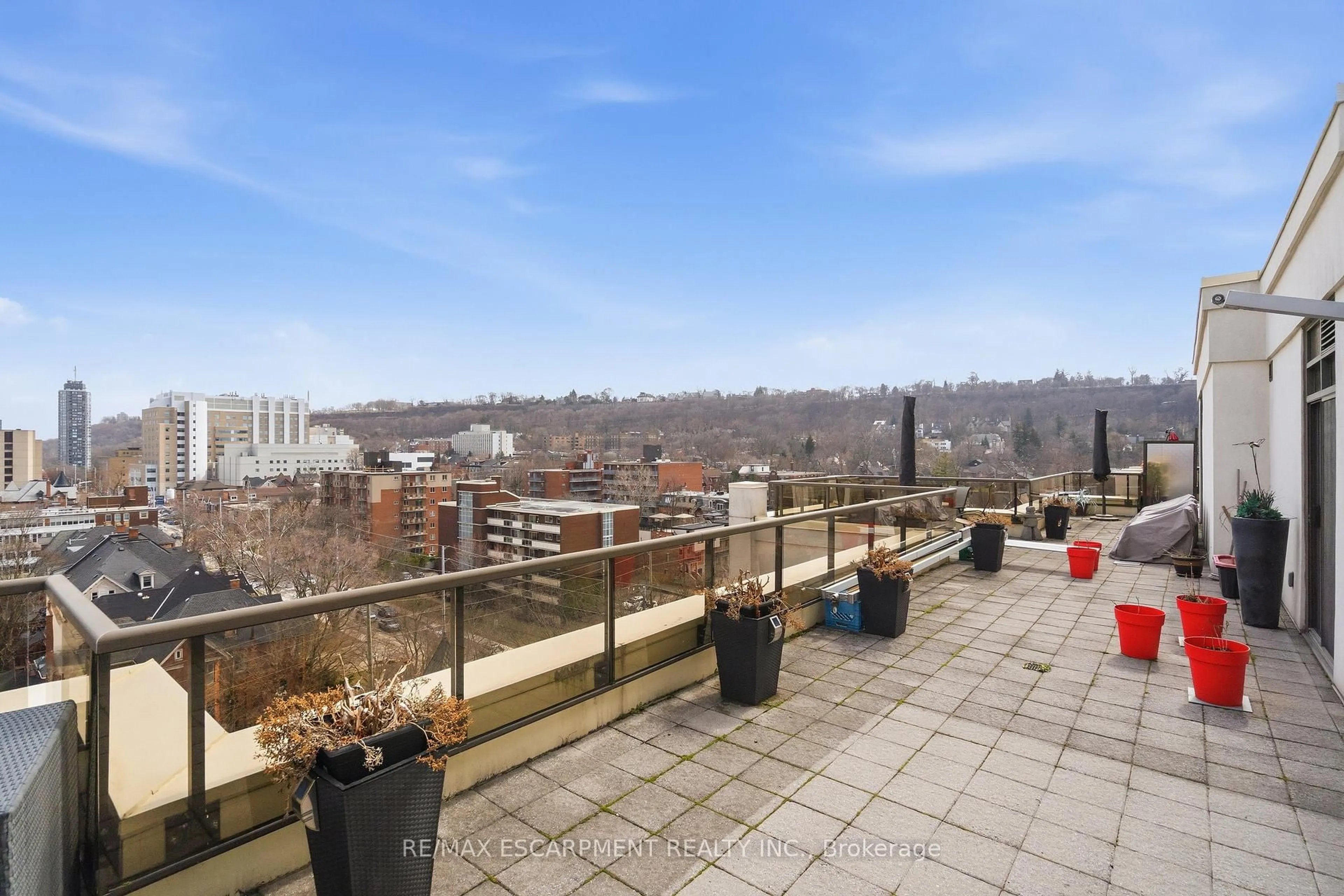 Patio, city buildings view from balcony for 90 CHARLTON Ave #PH1, Hamilton Ontario L8P 0B4