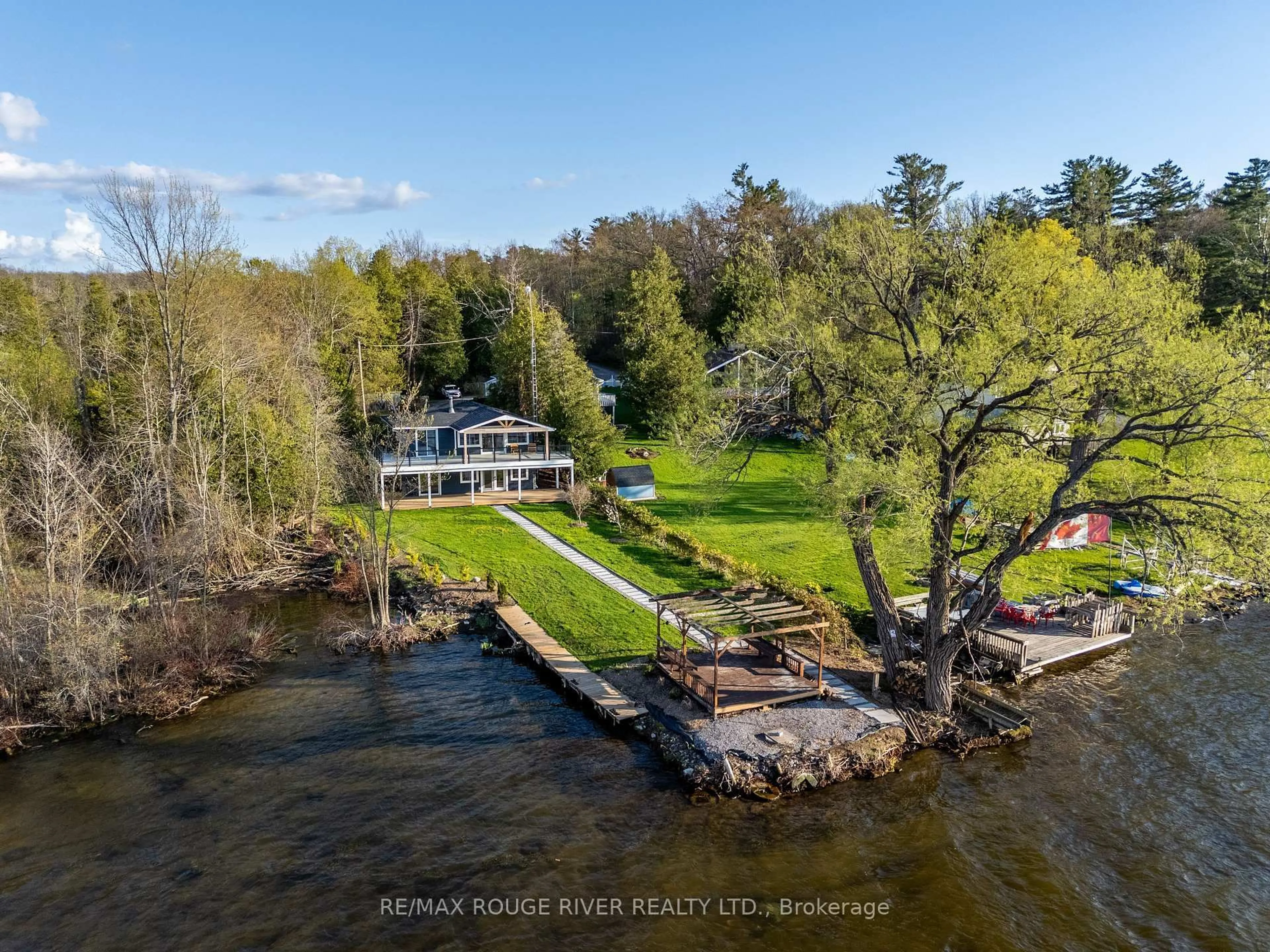 A pic from outside/outdoor area/front of a property/back of a property/a pic from drone, water/lake/river/ocean view for 5496 Rice Lake Scenic Dr #130, Hamilton Township Ontario K0K 2E0