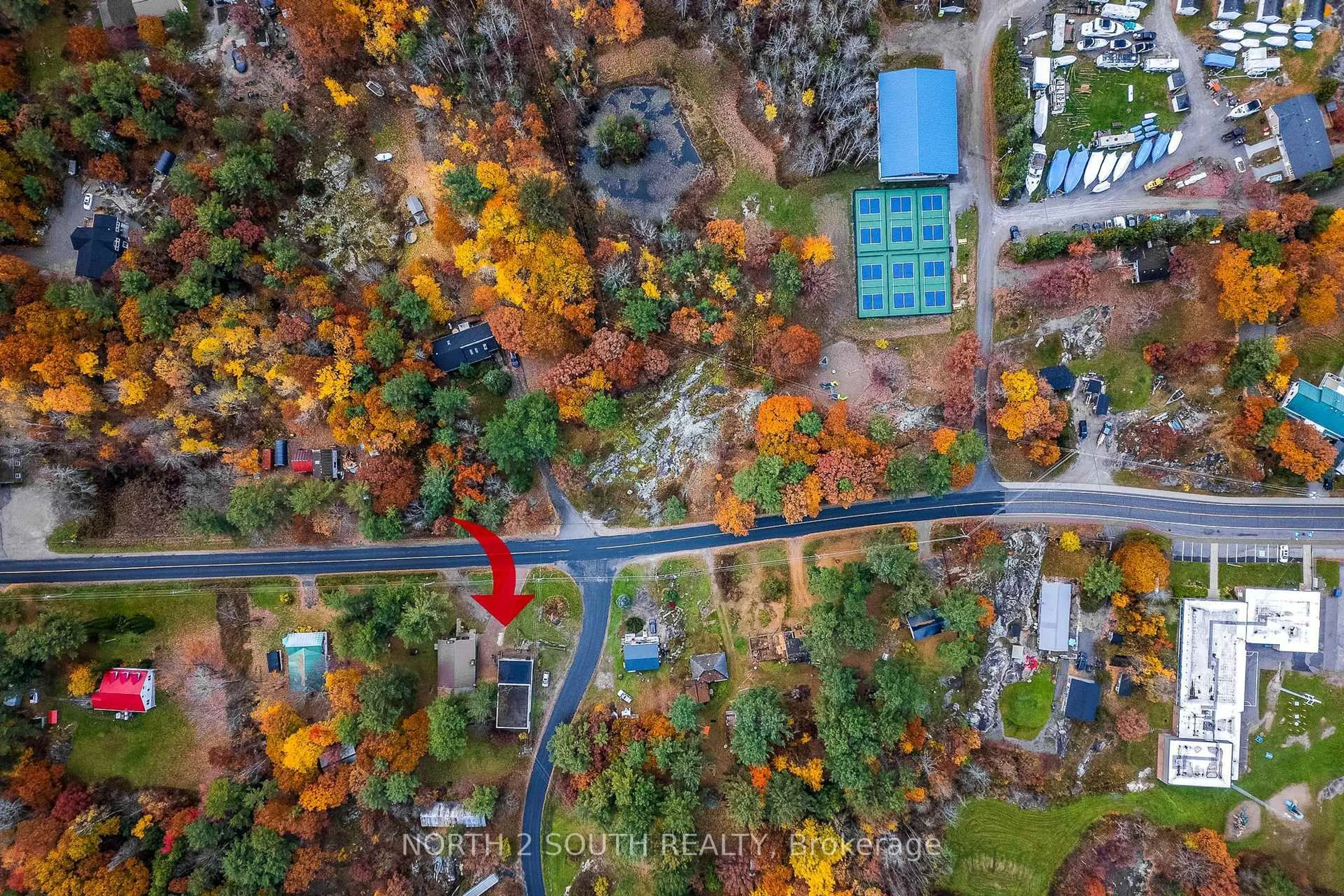 A pic from outside/outdoor area/front of a property/back of a property/a pic from drone, forest/trees view for 2512 Honey Harbour Rd, Georgian Bay Ontario P0E 1E0
