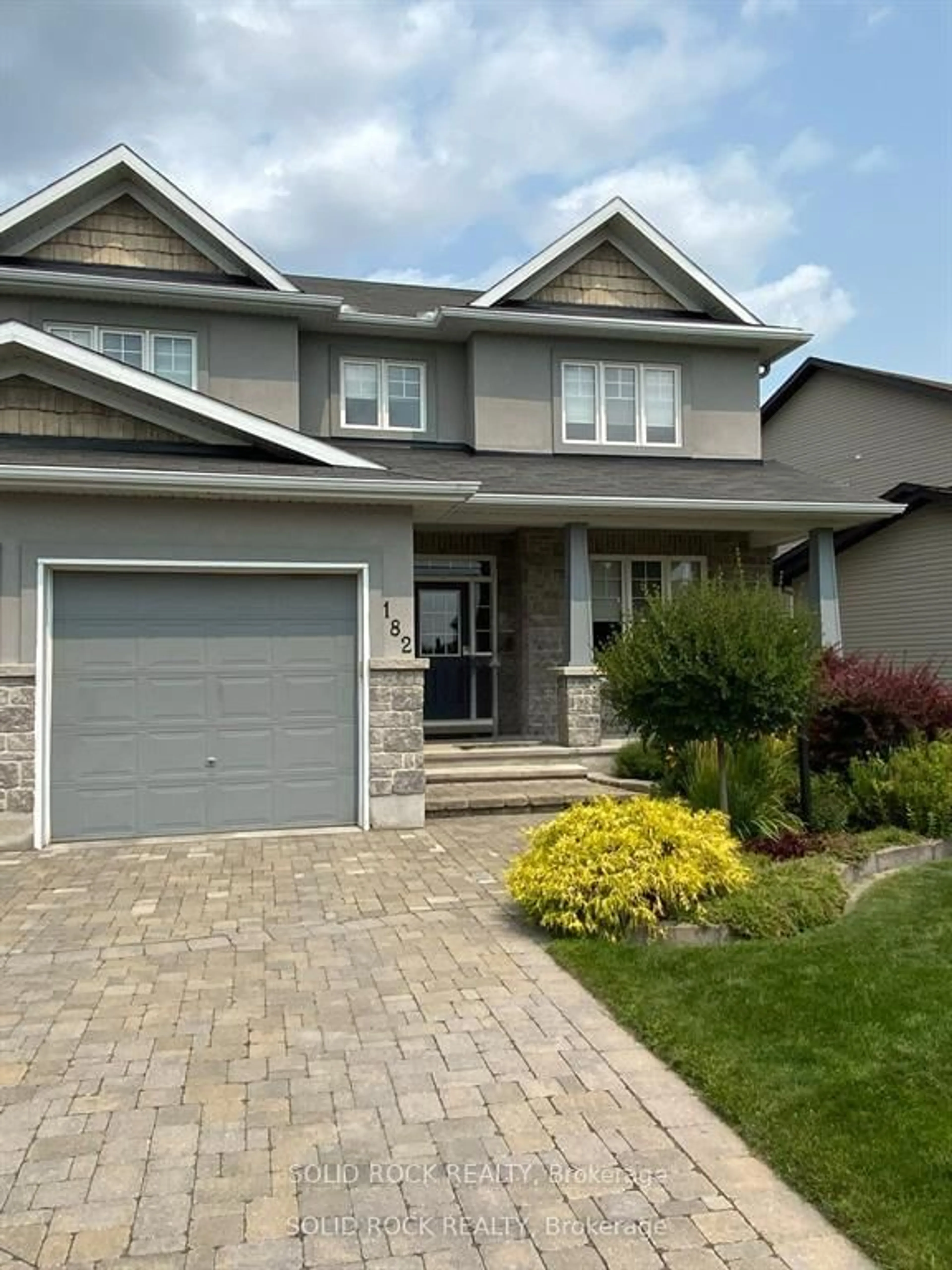 Home with vinyl exterior material, street for 182 Arthur St, Arnprior Ontario K7S 1A4