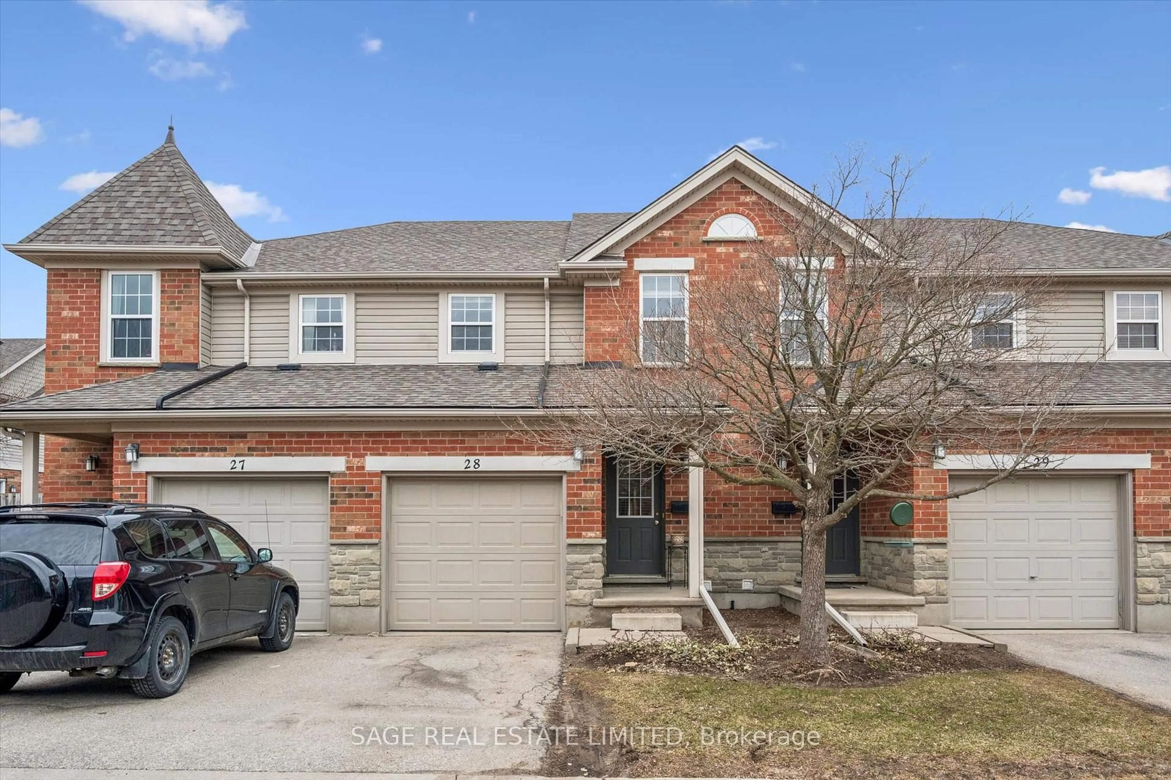 Home with brick exterior material, street for 124 GOSLING Gdns #28, Guelph Ontario N1G 5K6