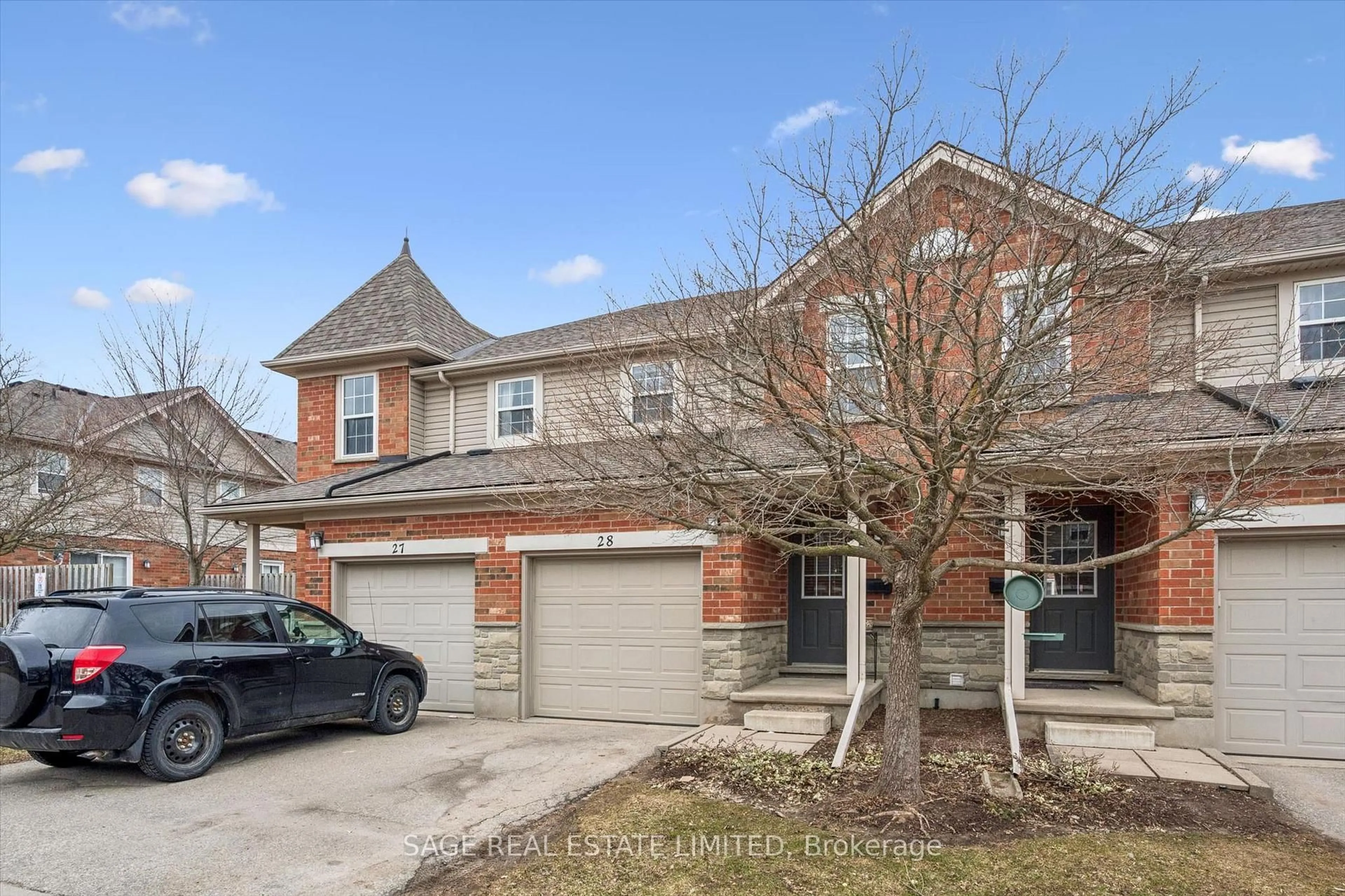 Home with brick exterior material, street for 124 GOSLING Gdns #28, Guelph Ontario N1G 5K6