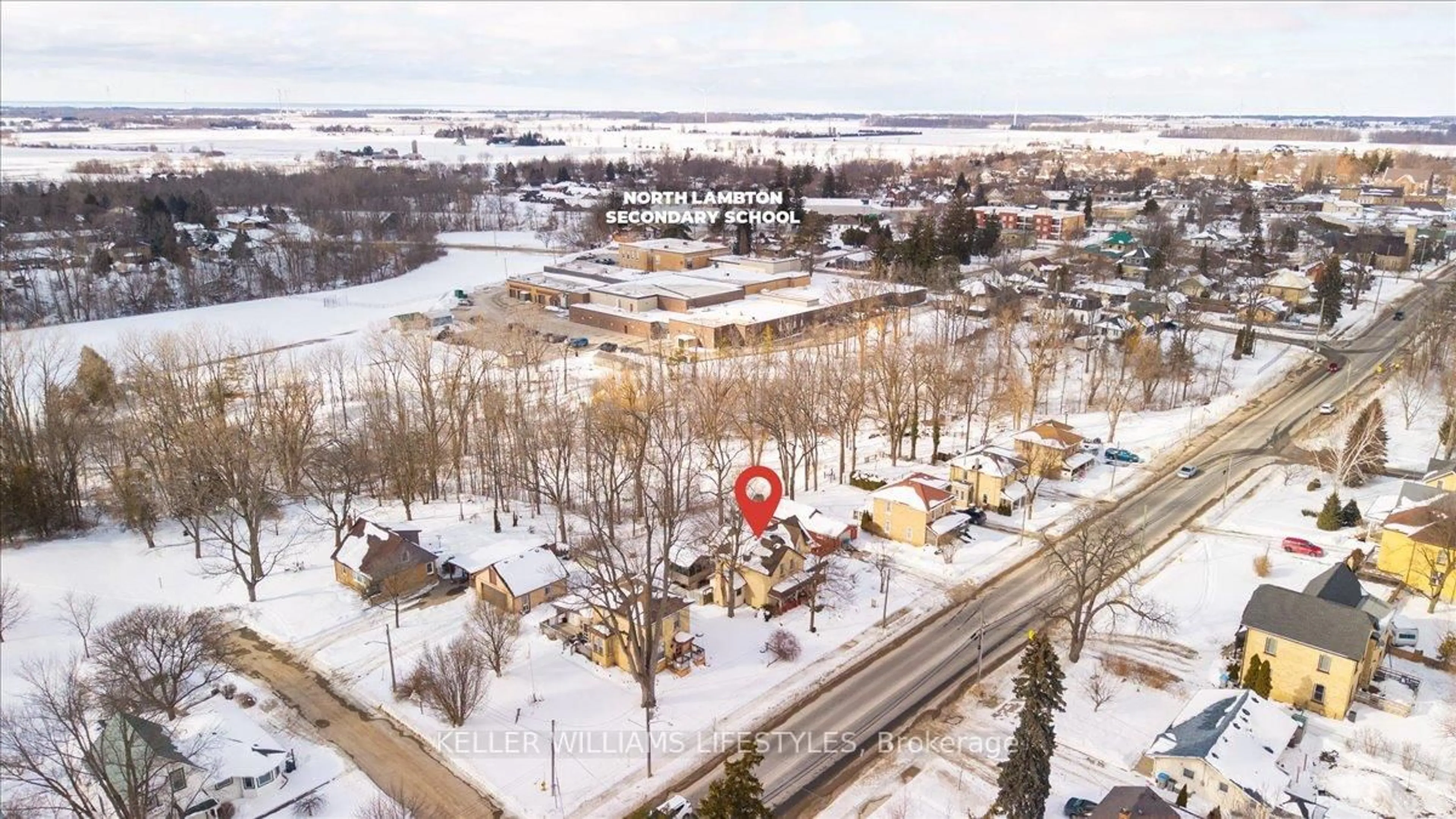 A pic from outside/outdoor area/front of a property/back of a property/a pic from drone, street for 54 Main St, Lambton Shores Ontario N0N 1J0