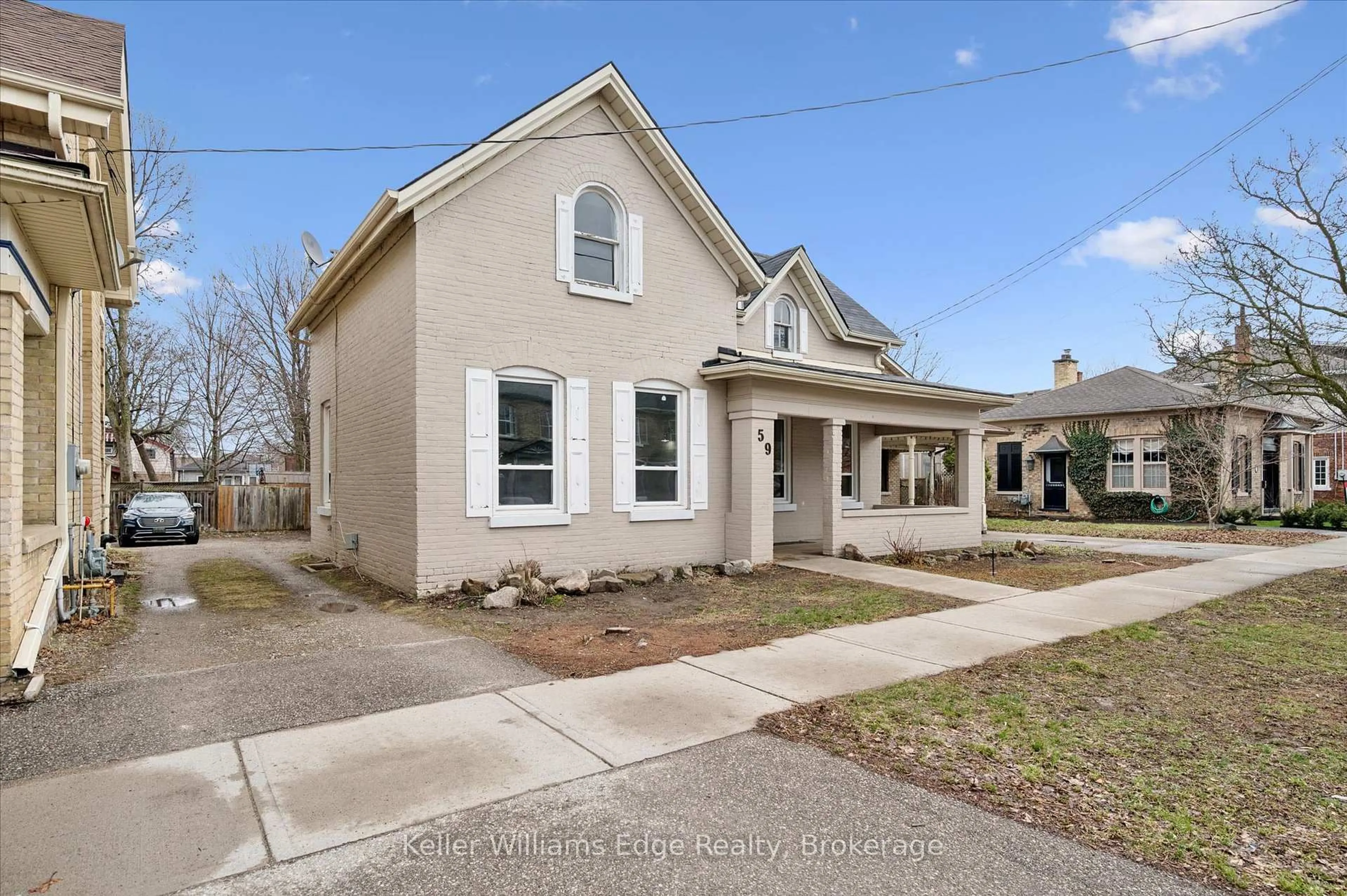 Home with brick exterior material, street for 59 William St, Brantford Ontario N3T 3K6