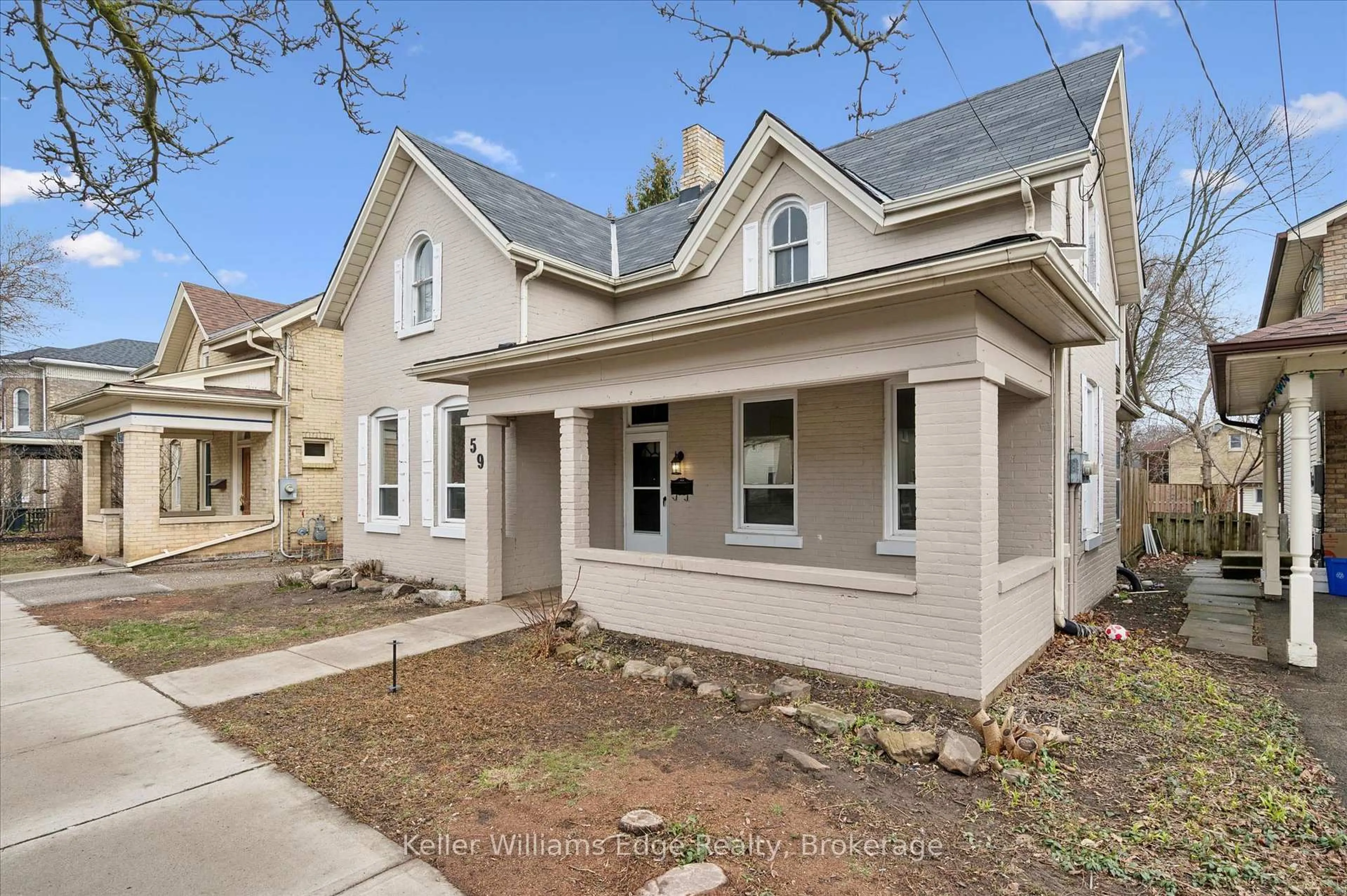 Home with vinyl exterior material, street for 59 William St, Brantford Ontario N3T 3K6