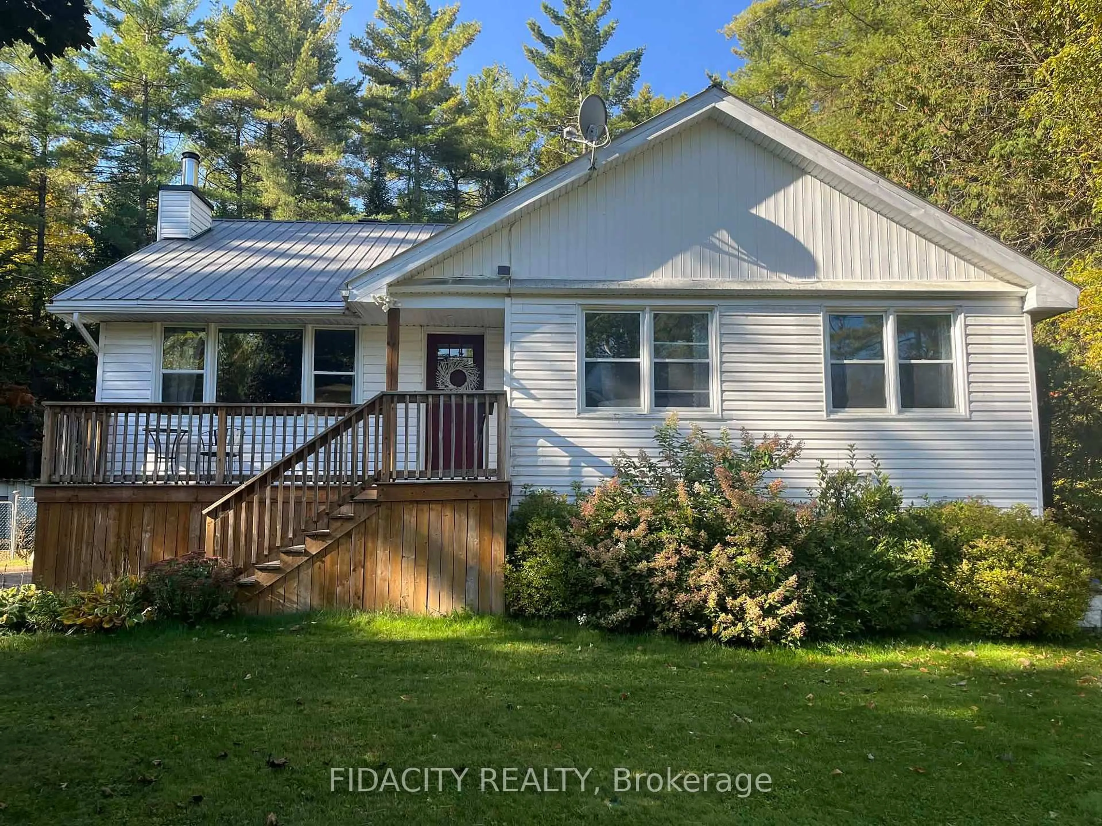 A pic from outside/outdoor area/front of a property/back of a property/a pic from drone, unknown for 145 Bellamy Rd, White Lake Ontario K0A 3L0