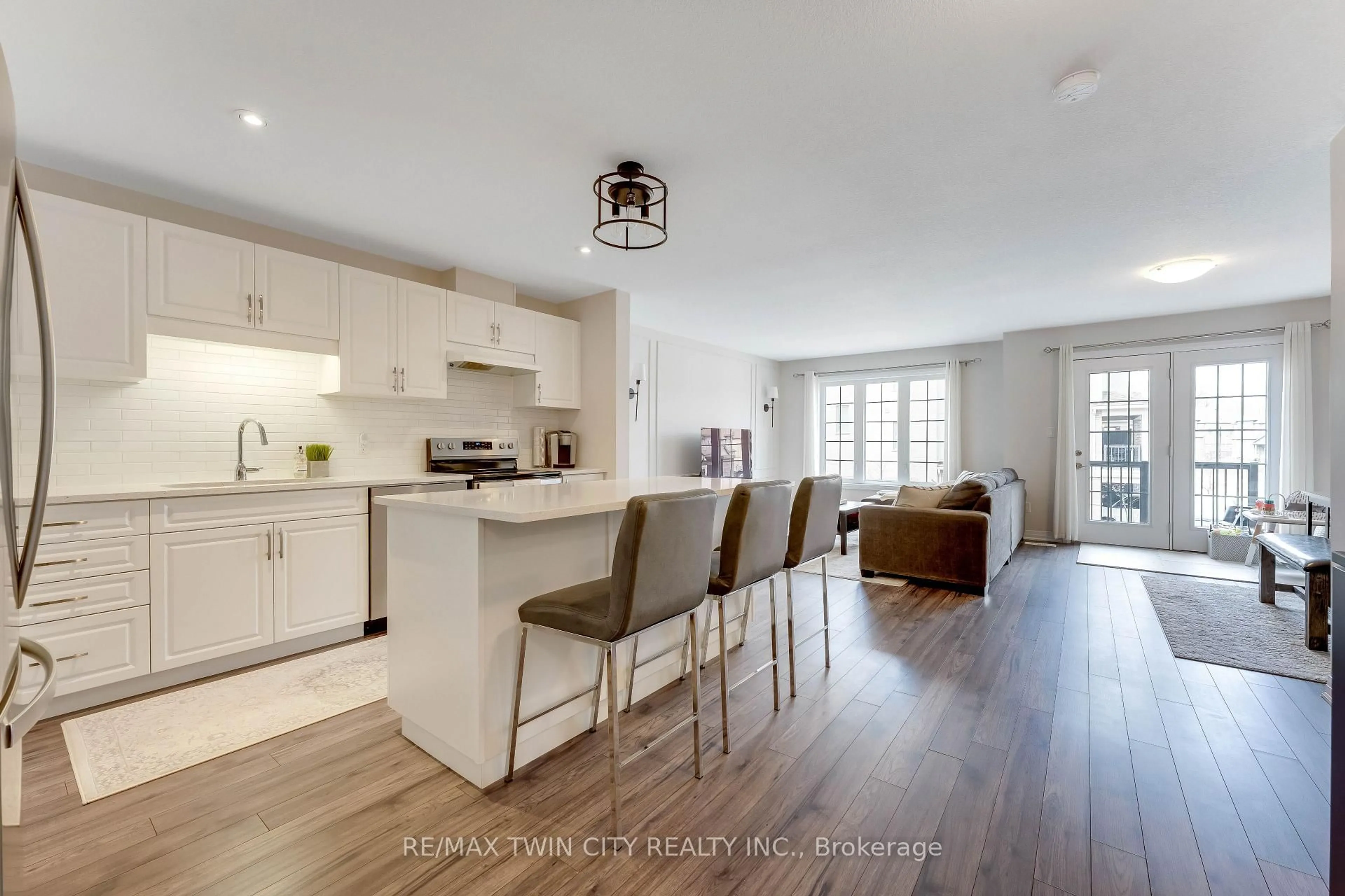 Open concept kitchen, wood/laminate floor for 115 South Creek Dr #6C, Kitchener Ontario N2P 0H2