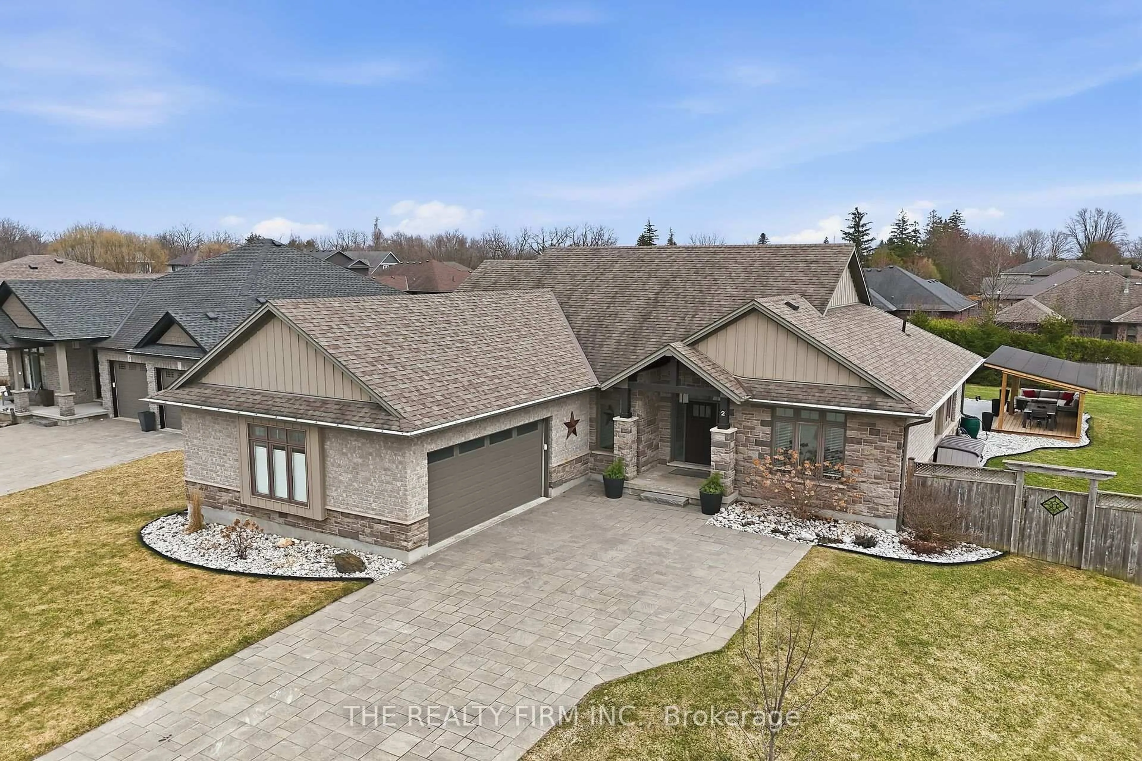 A pic from outside/outdoor area/front of a property/back of a property/a pic from drone, street for 2 Slammer Tr, Thames Centre Ontario N0M 2P0