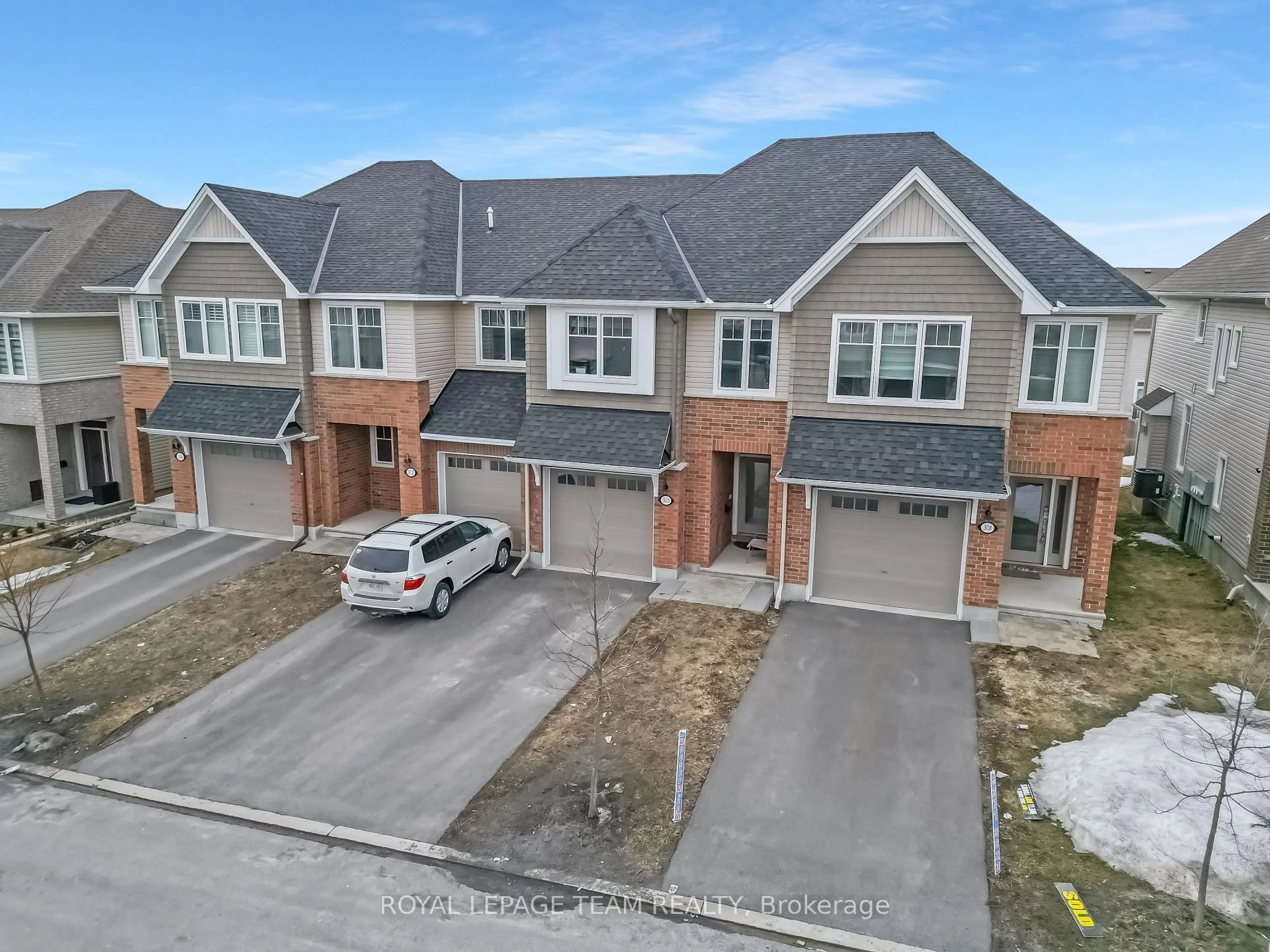 A pic from outside/outdoor area/front of a property/back of a property/a pic from drone, street for 310 Kanashtage Terr, Ottawa Ontario K4A 5J9