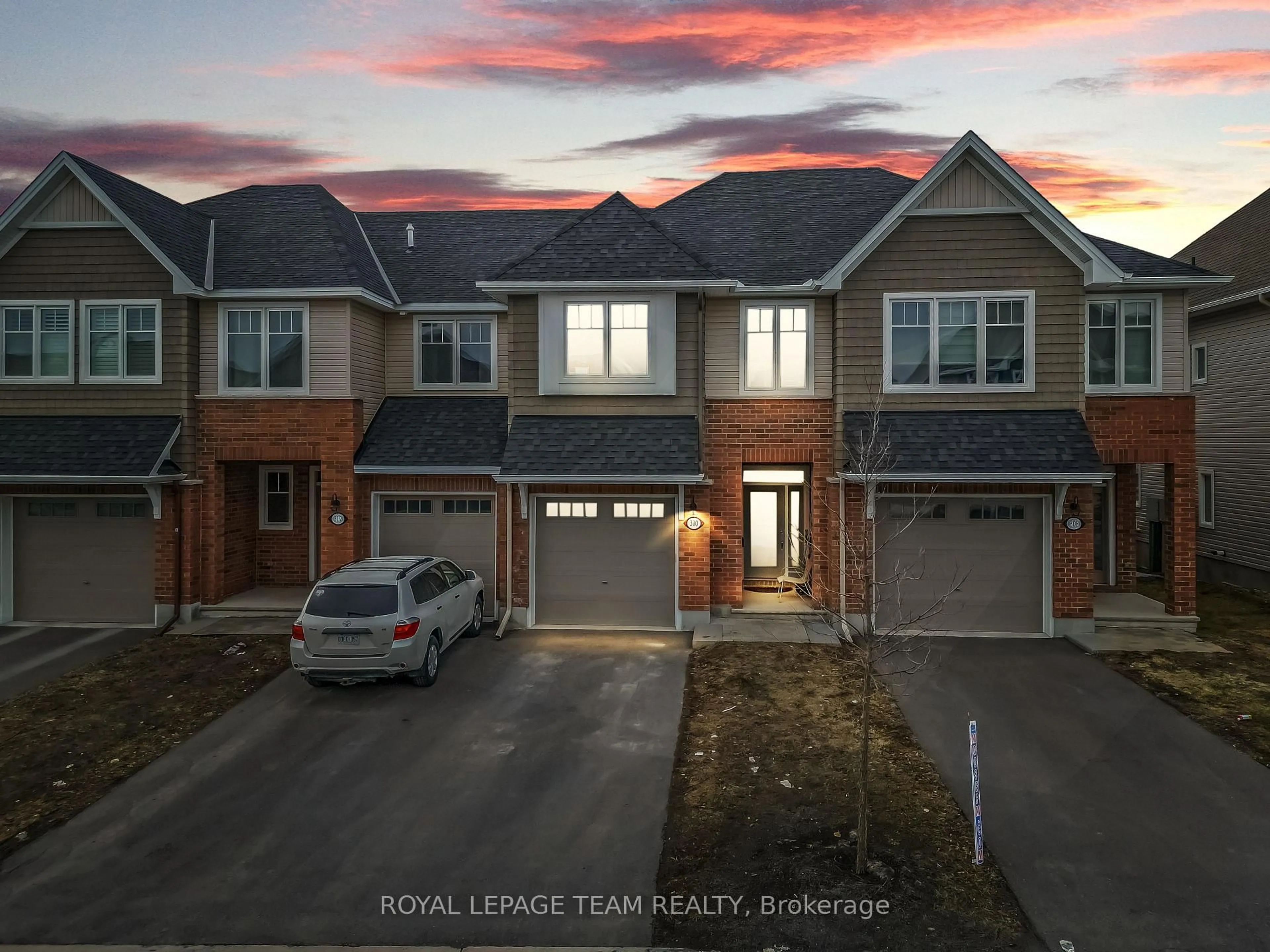 A pic from outside/outdoor area/front of a property/back of a property/a pic from drone, street for 310 Kanashtage Terr, Ottawa Ontario K4A 5J9