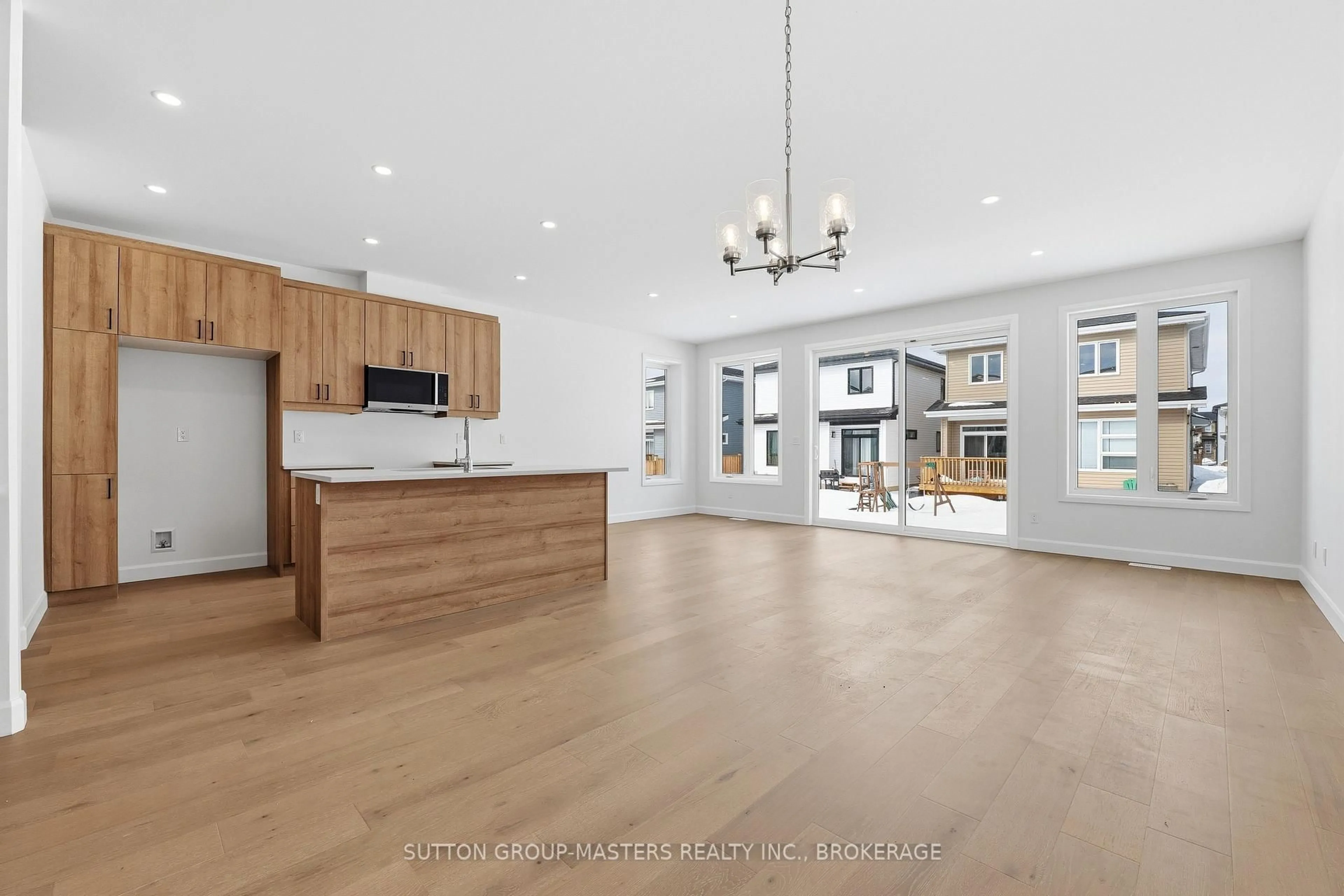 Open concept kitchen, wood/laminate floor for 218 Superior Dr, Loyalist Ontario K7N 0G1