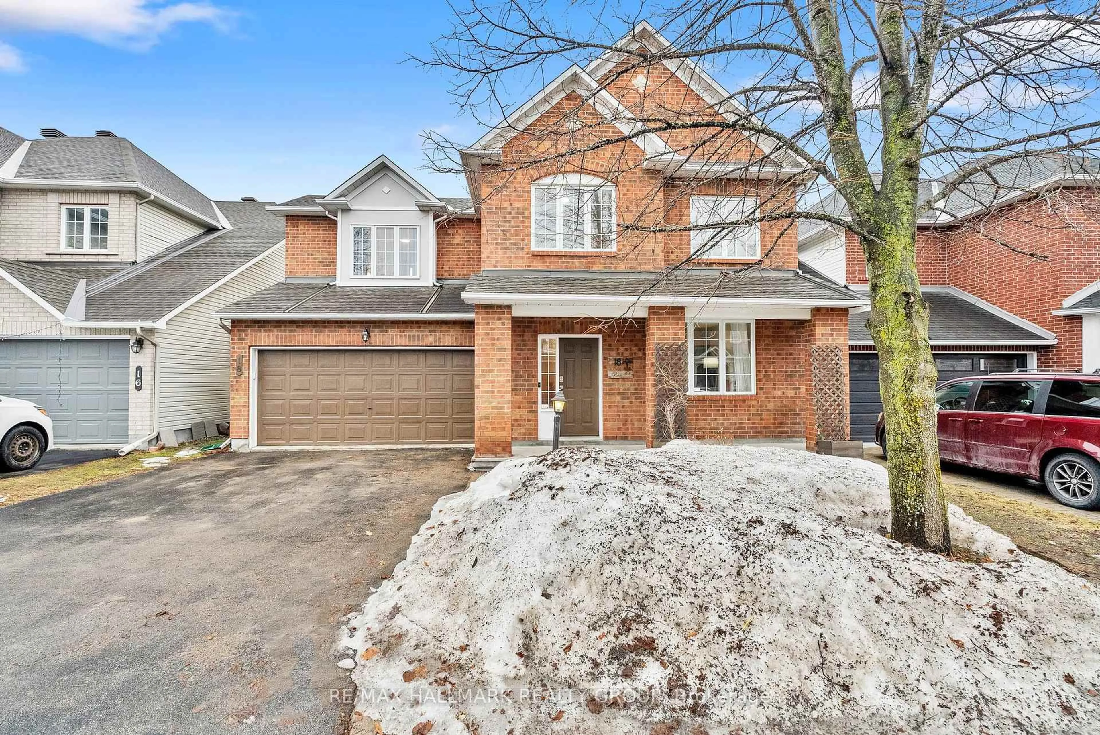 Home with brick exterior material, street for 18 Irish Rose Cres, Ottawa Ontario K2J 4T7