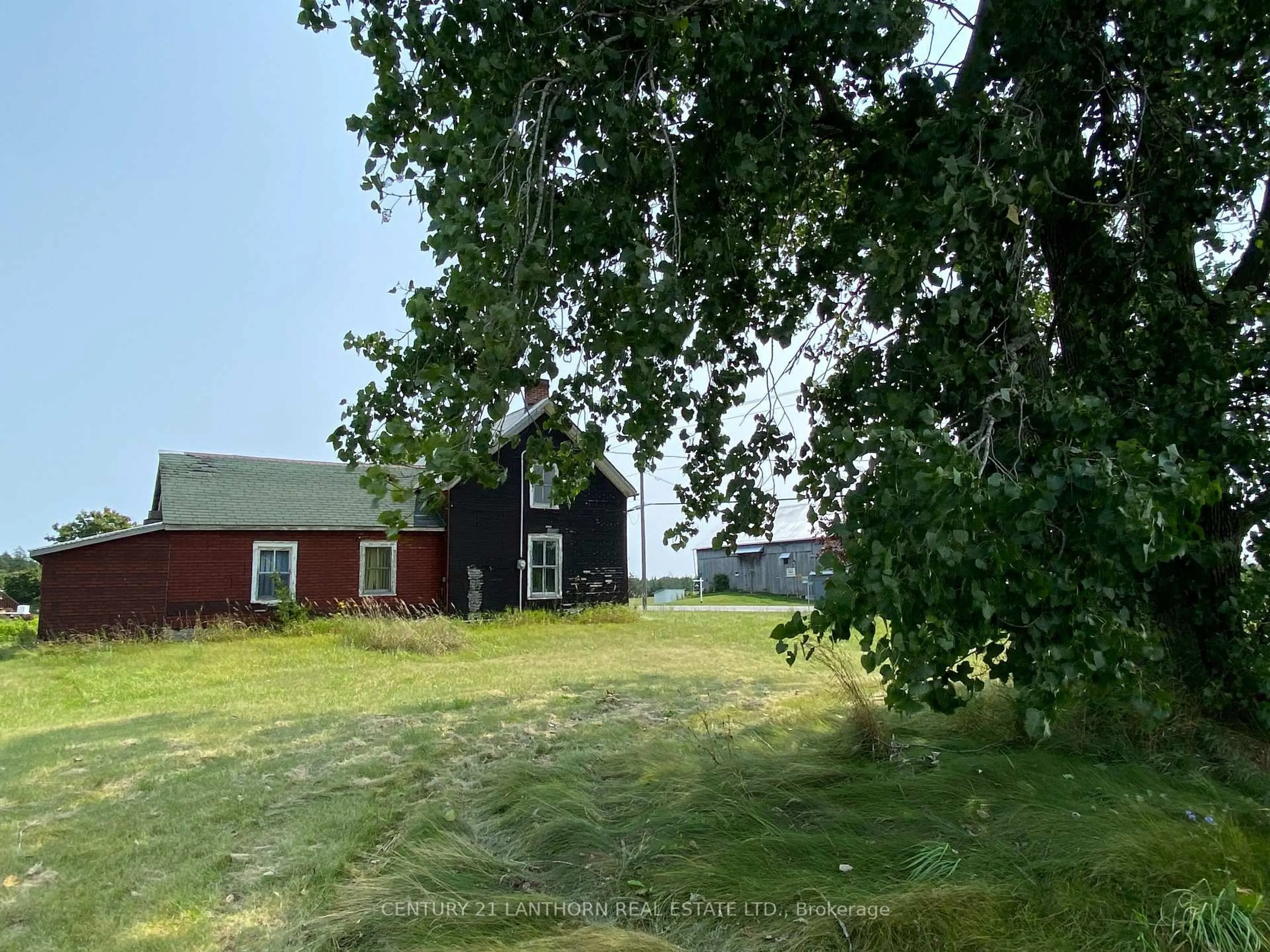 A pic from outside/outdoor area/front of a property/back of a property/a pic from drone, mountain view for 1677 County 8 Rd, Prince Edward County Ontario K0K 2T0