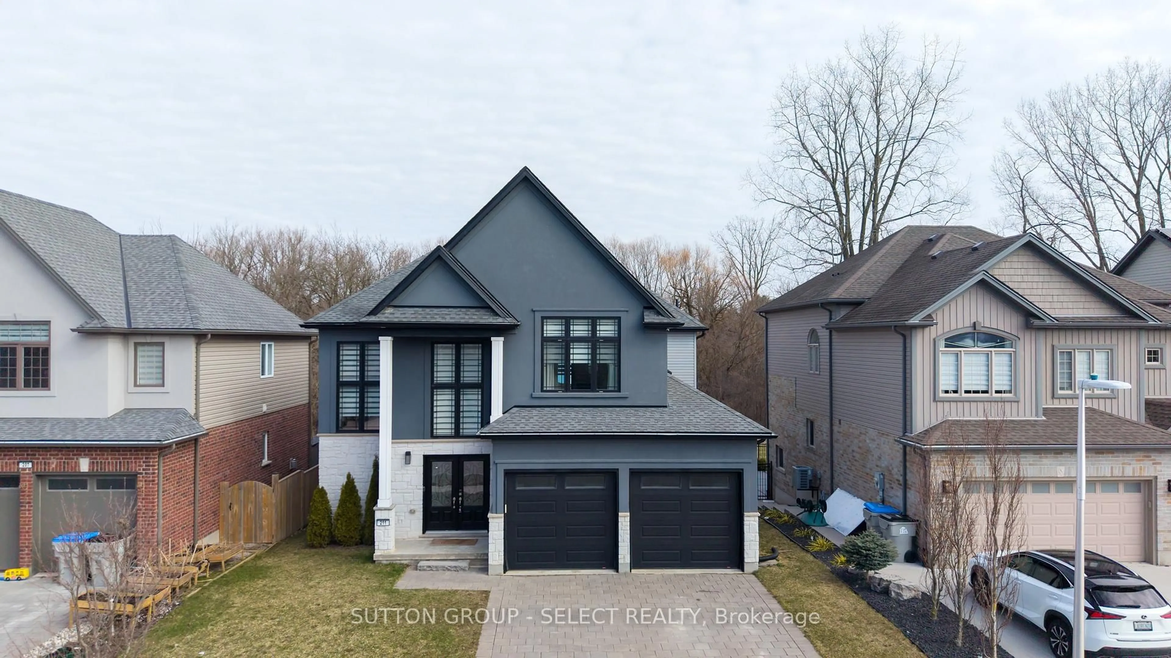 Home with brick exterior material, street for 211 Union Ave, Middlesex Centre Ontario N0L 1R0