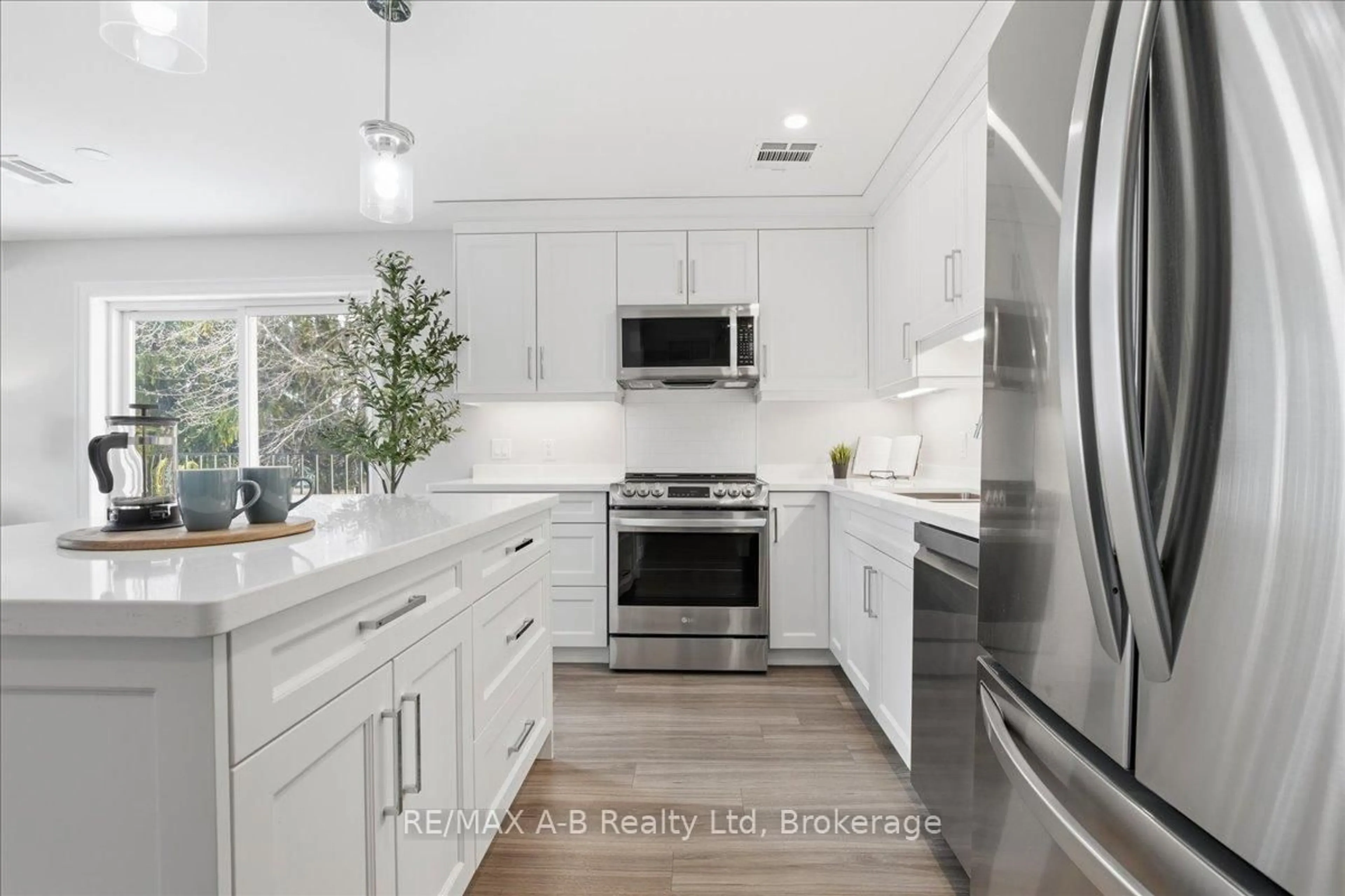 Contemporary kitchen, ceramic/tile floor for 100 Gordon St #204, Stratford Ontario N5A 7T8