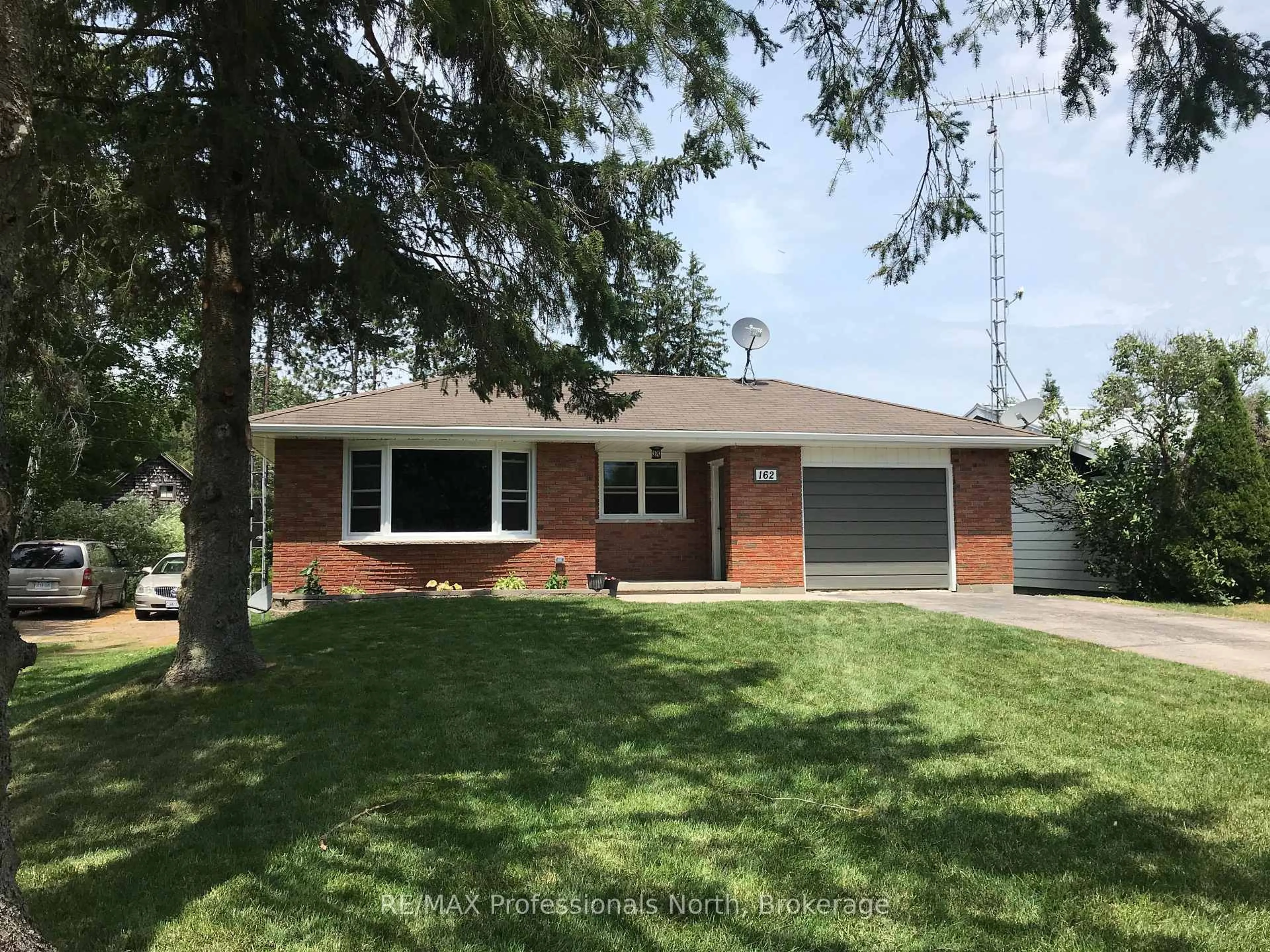 Home with brick exterior material, street for 162 Hillside Dr, Kawartha Lakes Ontario K0M 1C0