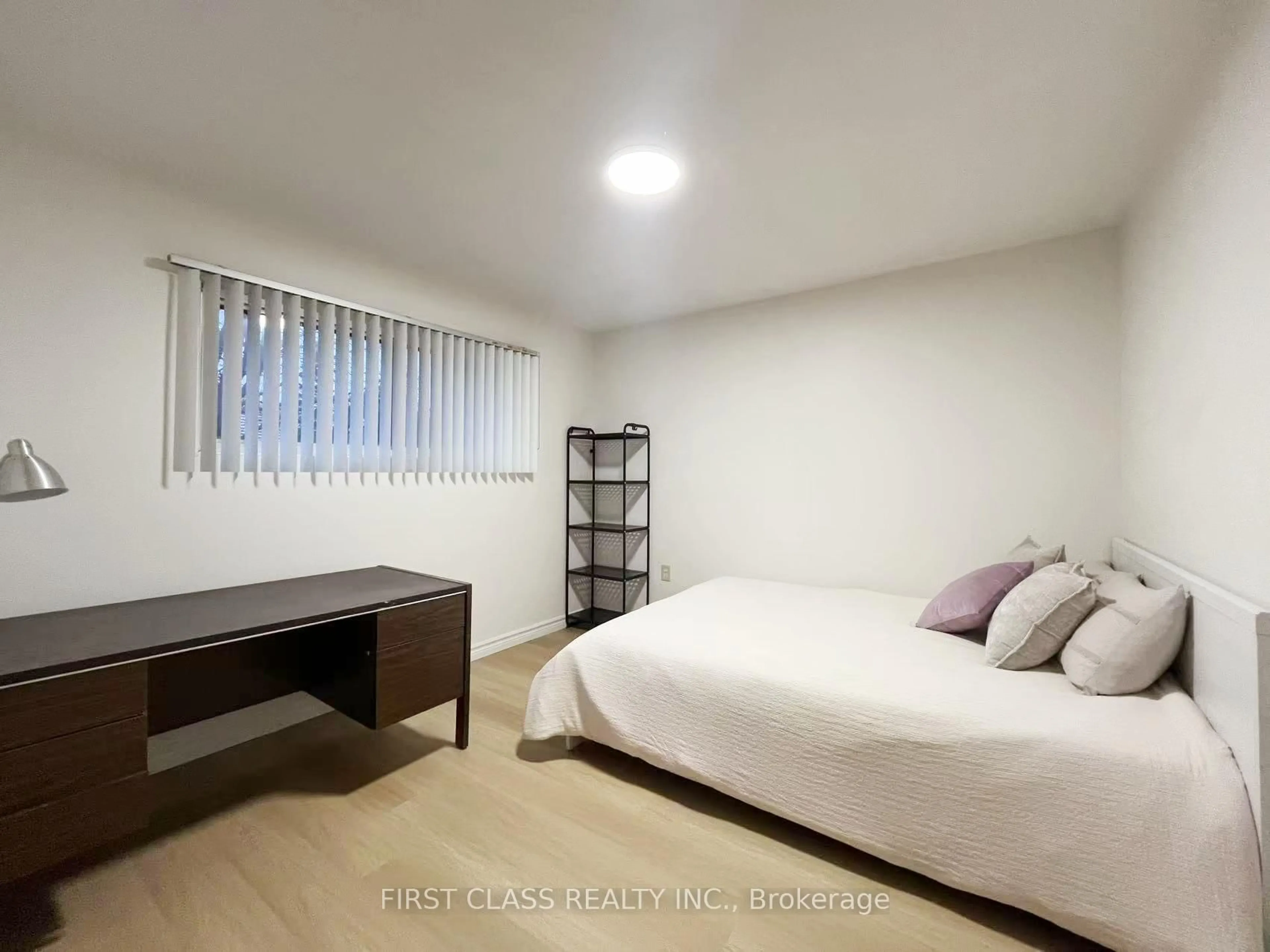 Bedroom with bed, wood/laminate floor for 88 Radford St, Hamilton Ontario L8S 3E6