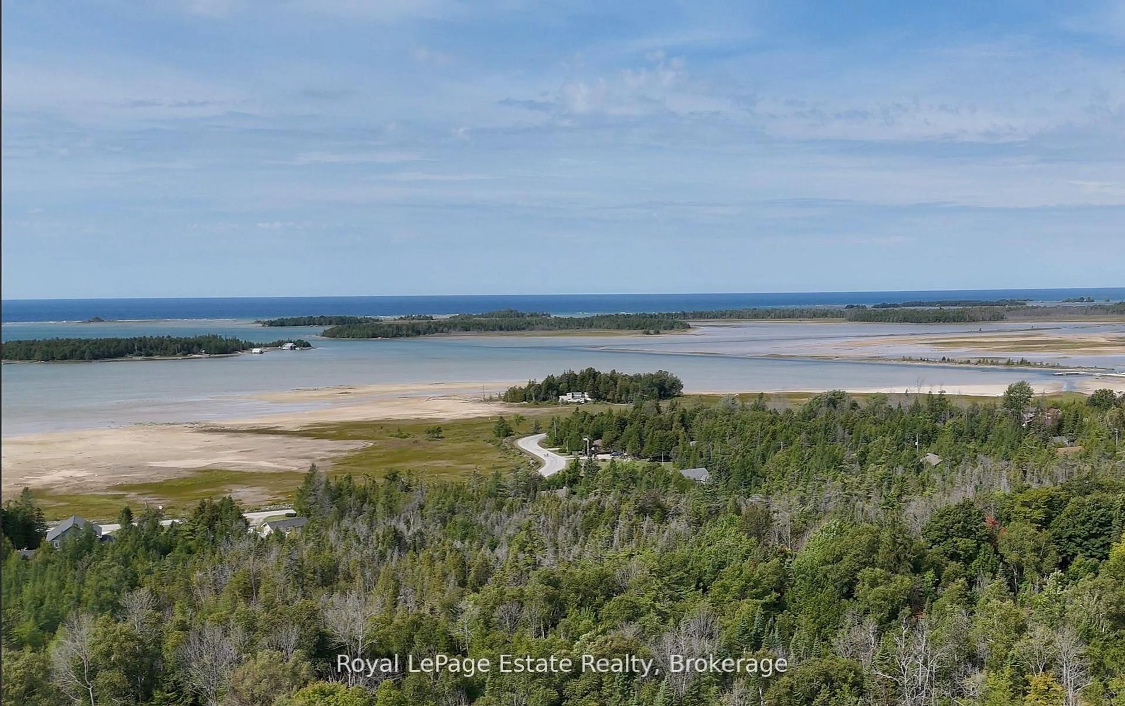 A pic from outside/outdoor area/front of a property/back of a property/a pic from drone, water/lake/river/ocean view for 44 Whitefish Blvd, South Bruce Peninsula Ontario N0H 2T0
