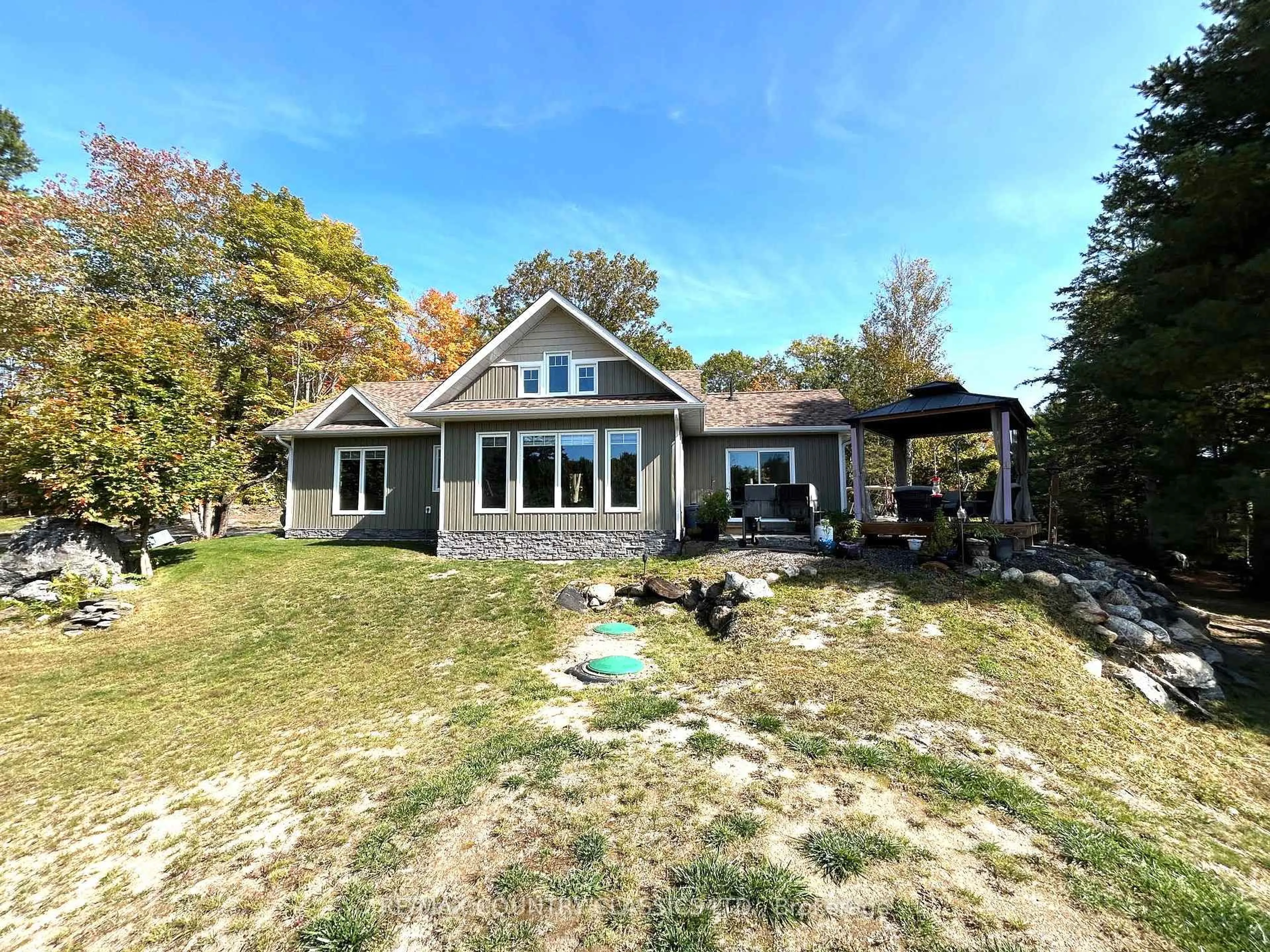 A pic from outside/outdoor area/front of a property/back of a property/a pic from drone, water/lake/river/ocean view for 170 Bunny Tr, McDougall Ontario P2A 2W7