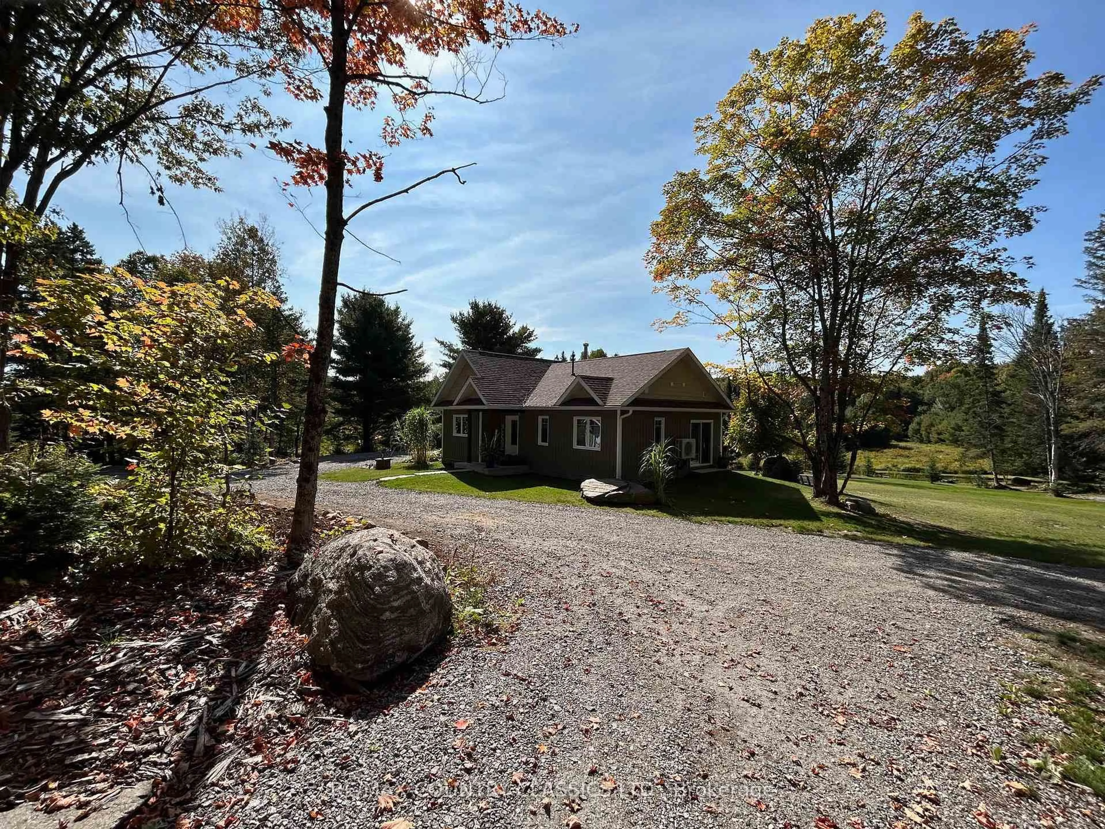 A pic from outside/outdoor area/front of a property/back of a property/a pic from drone, unknown for 170 Bunny Tr, McDougall Ontario P2A 2W7