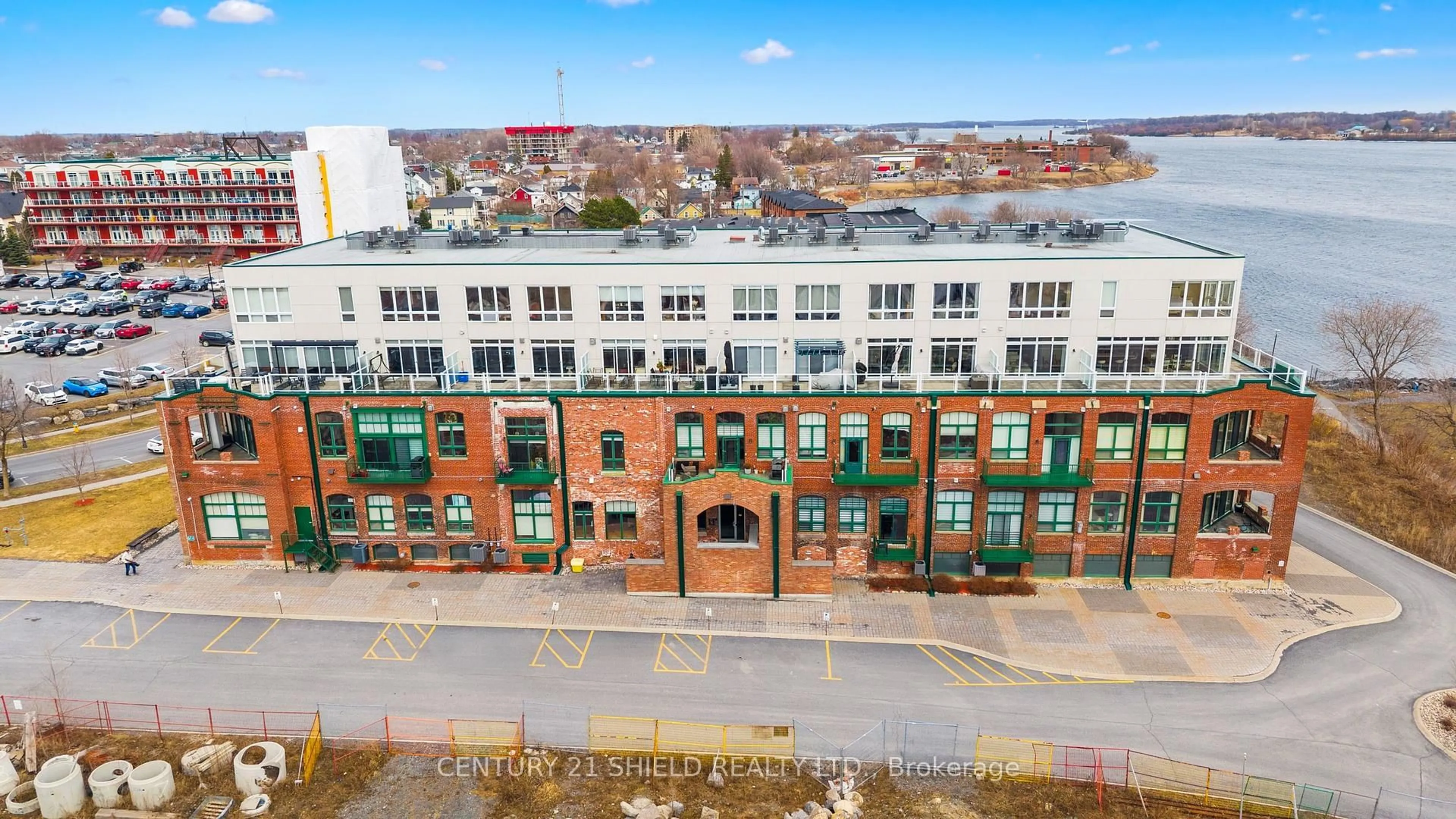 A pic from outside/outdoor area/front of a property/back of a property/a pic from drone, building for 703 Cotton Mill St #304, Cornwall Ontario K6H 0E7