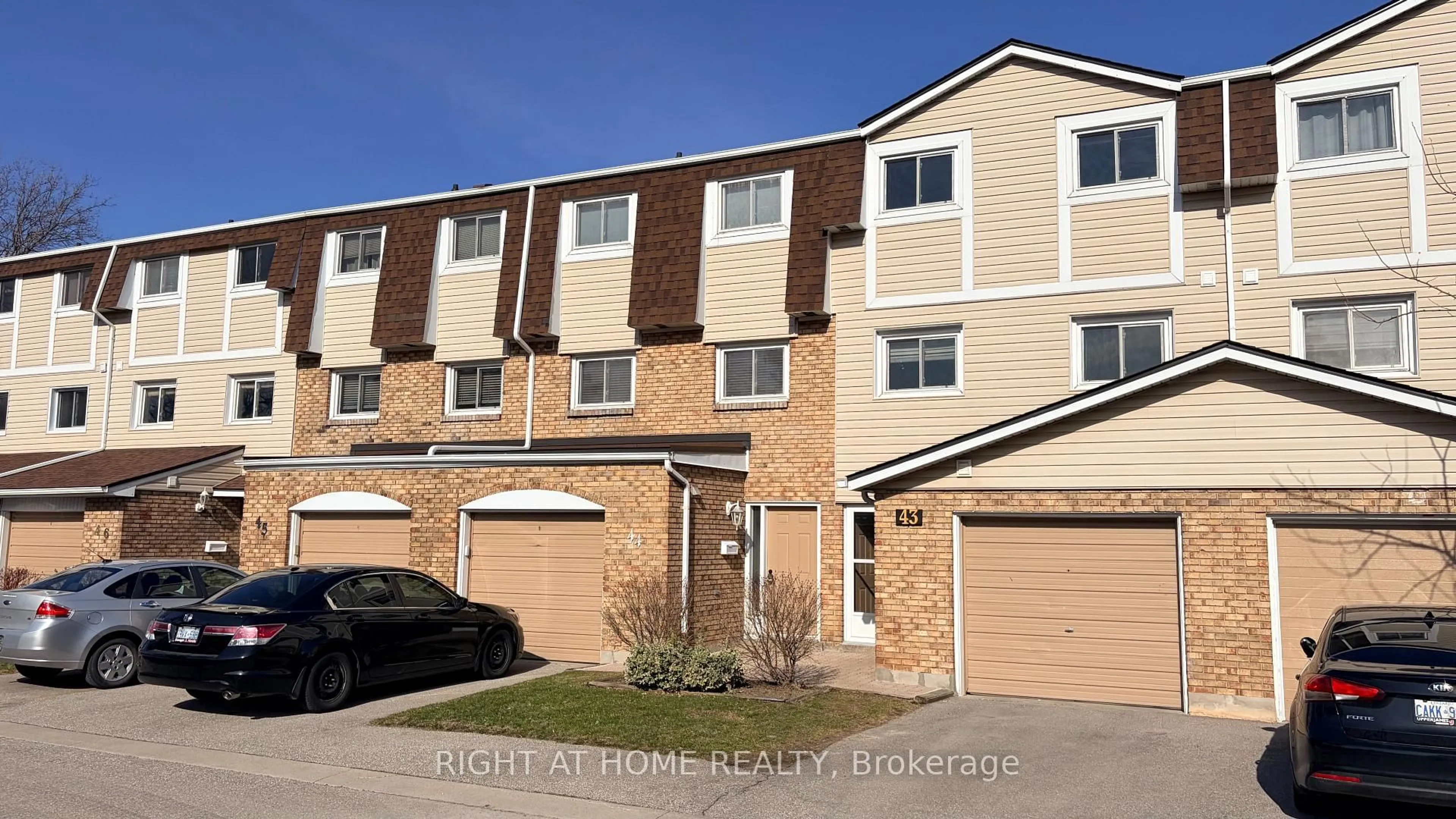 Home with brick exterior material, street for 11 Harrisford St #43, Hamilton Ontario L8K 6L7