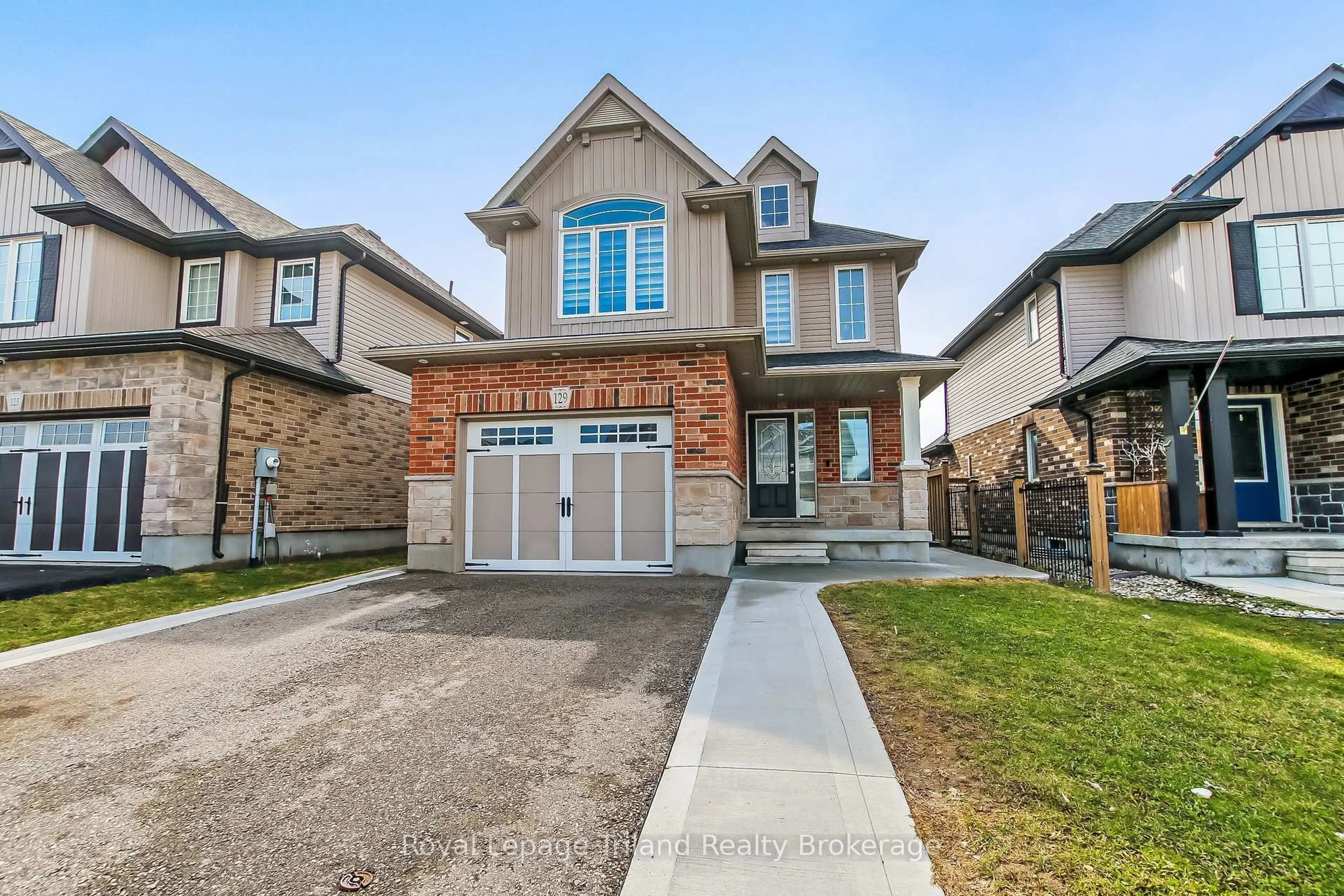 Home with brick exterior material, street for 129 Passchendaele St, Woodstock Ontario N4T 0J3