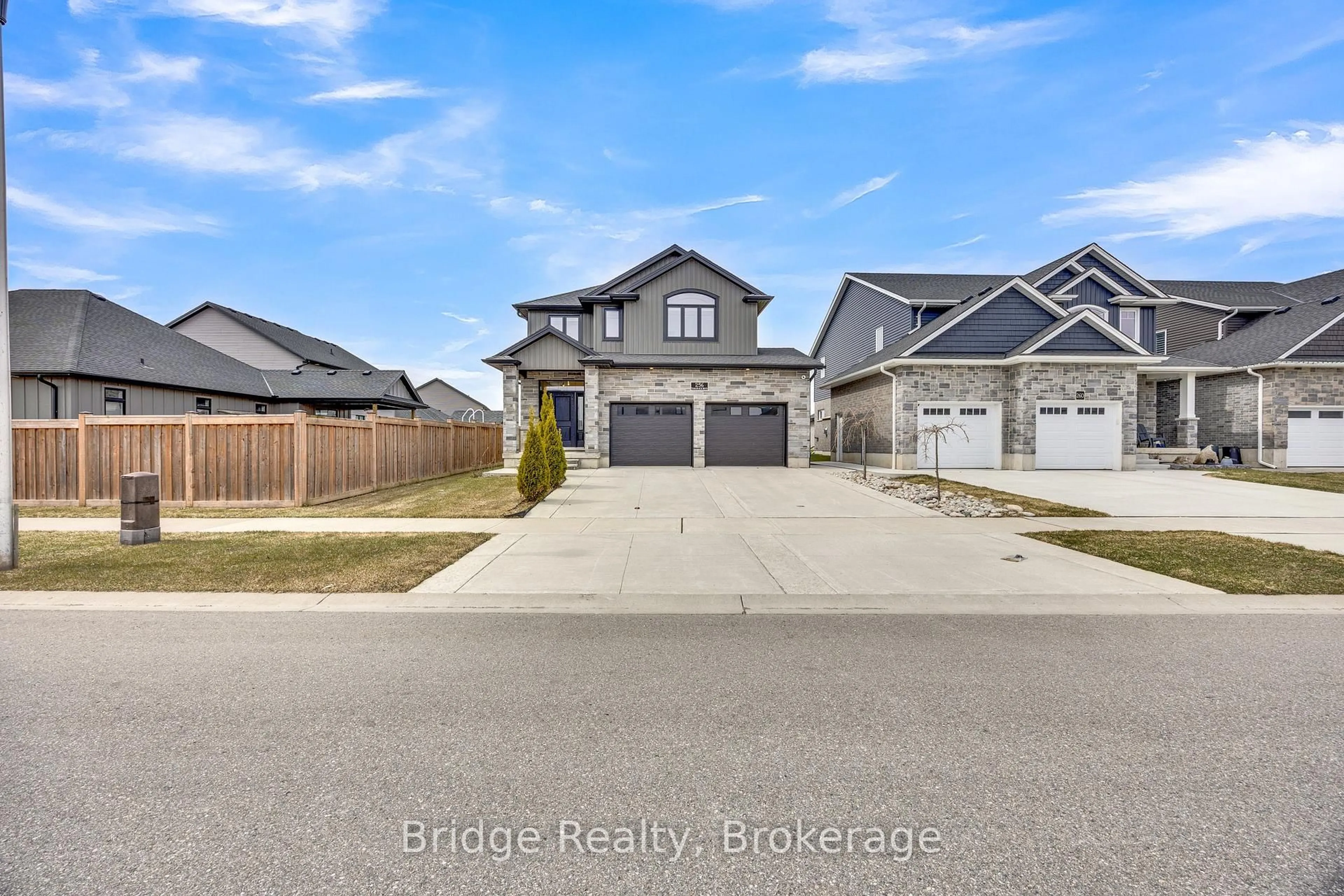 A pic from outside/outdoor area/front of a property/back of a property/a pic from drone, street for 256 Tamarack Blvd, Woodstock Ontario N4S 0E2